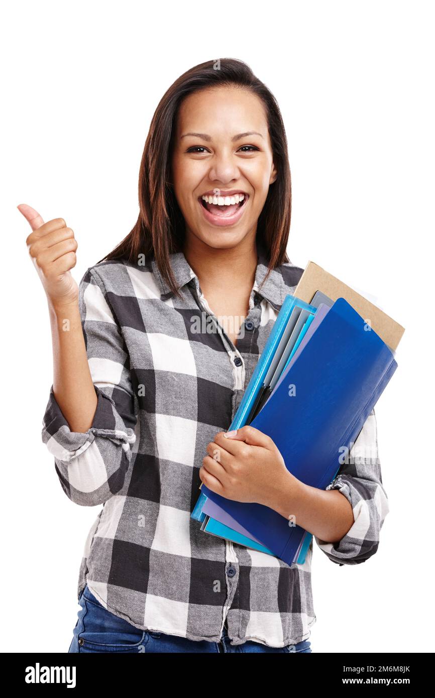 Aced that test. Portrait of an attractive young woman giving a thumbs ...