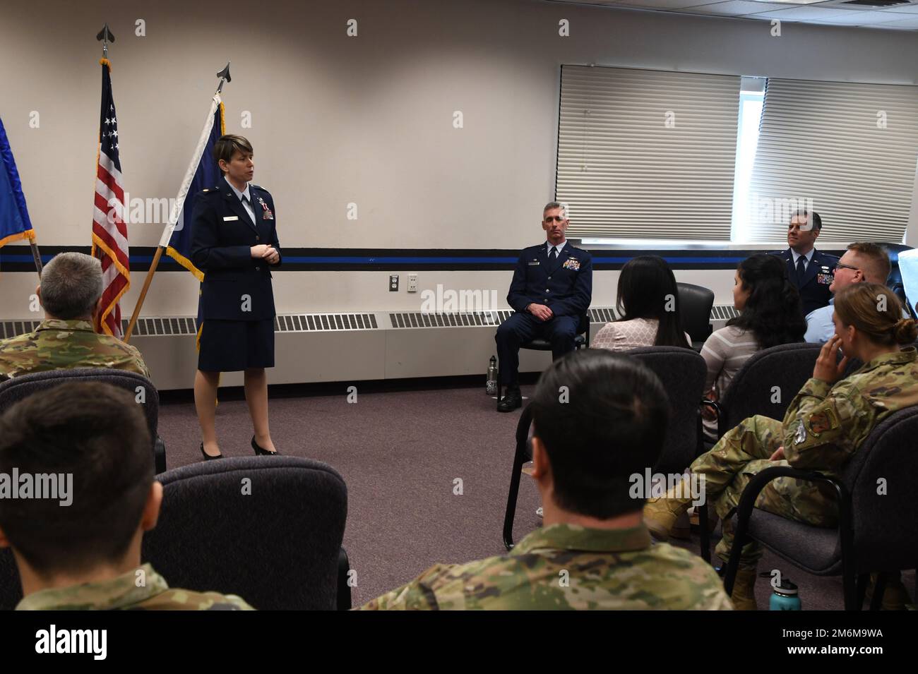 Maj. Sara Kerr, outgoing 168th Force Support Squadron commander, speaks during the 168th FSS