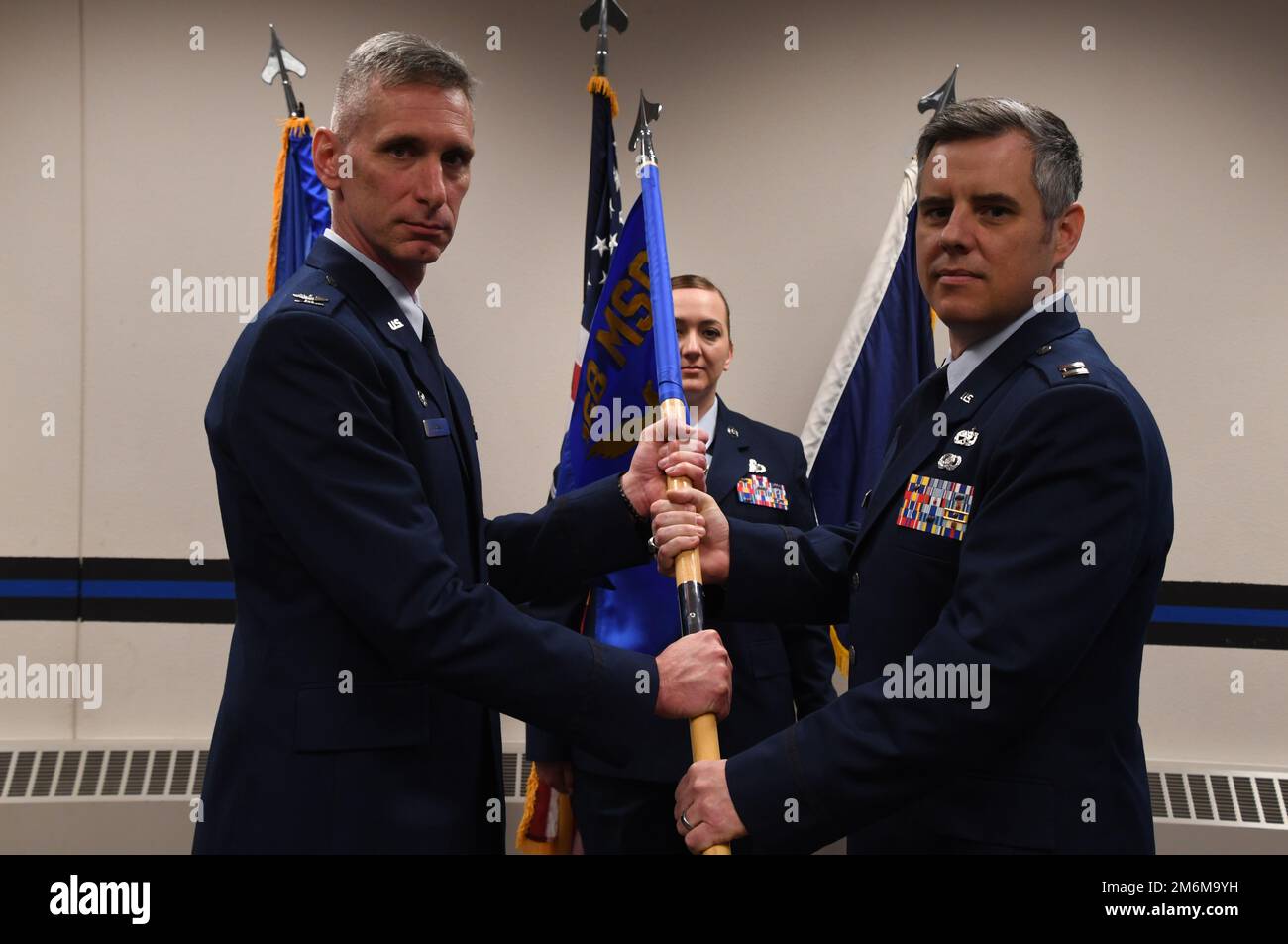 Col. Edward Borneo, 168th Mission Support Group commander, passes the ...