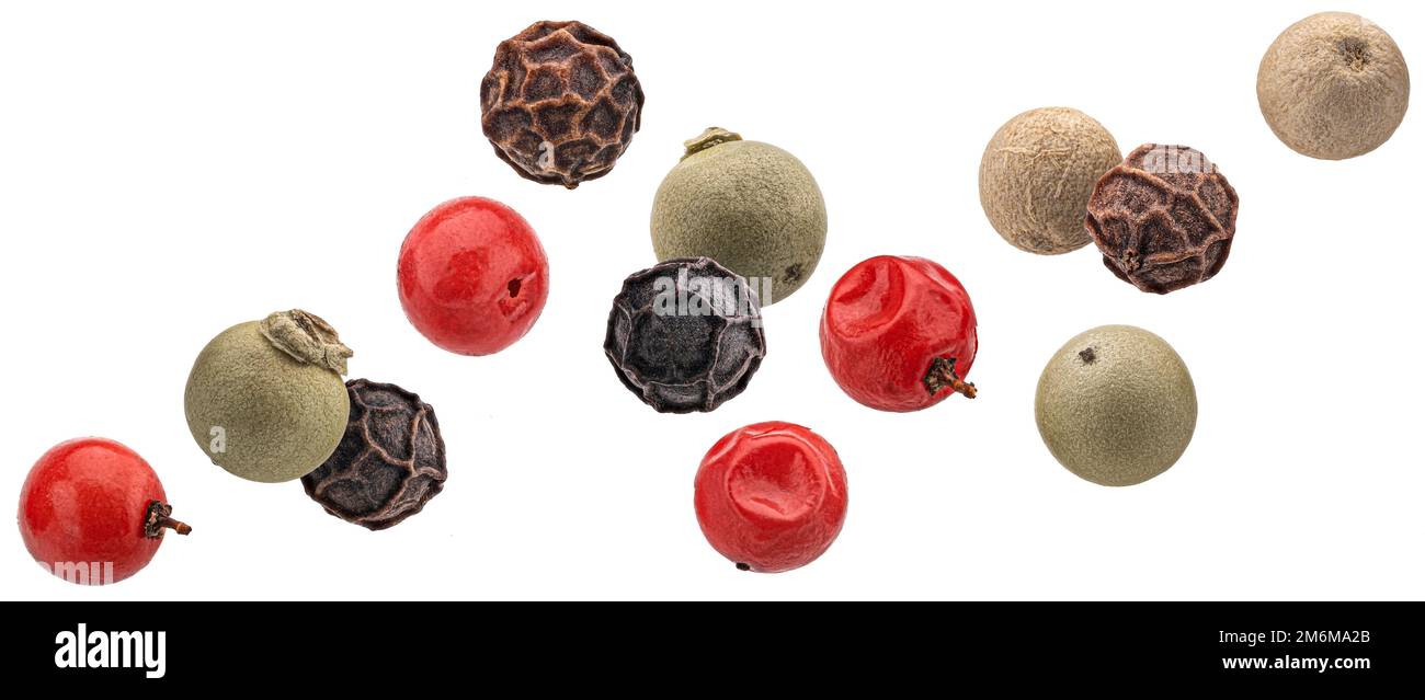 Falling peppercorns isolated on white background Stock Photo