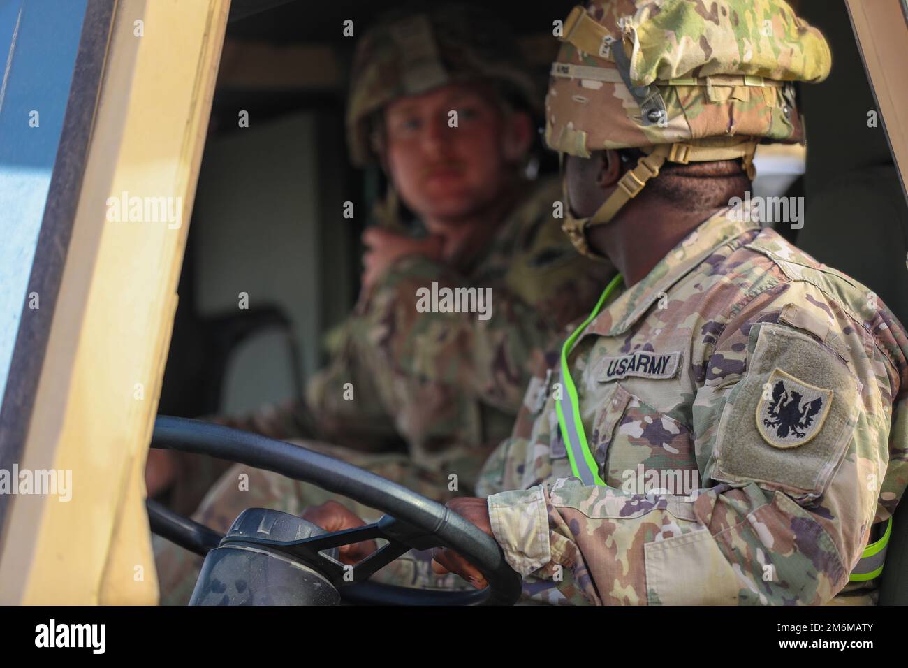 U.S. Army Spc. Eric Marah, right, and Spc. Robert Drolet, left, with