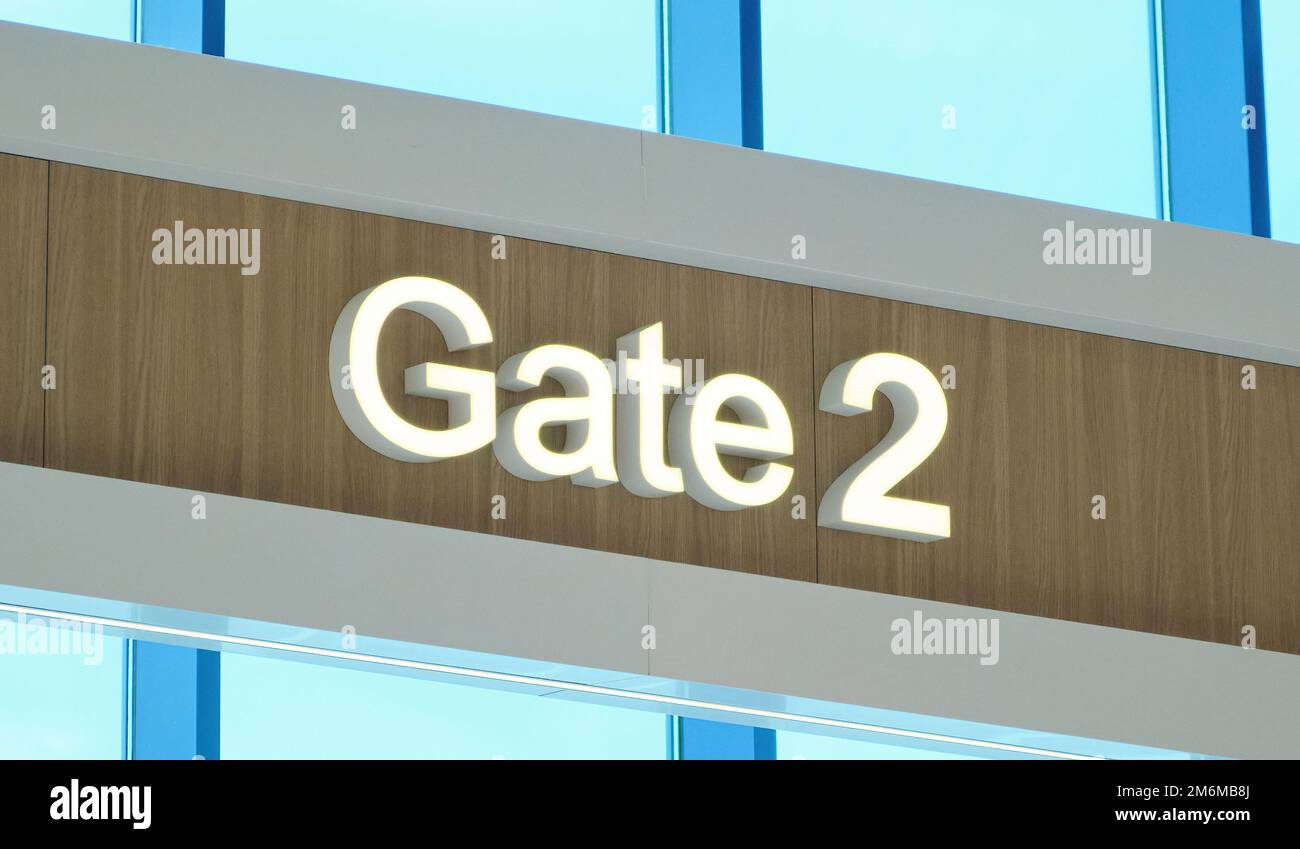 Airport gate sign terminal number two fly entrance Stock Photo Alamy