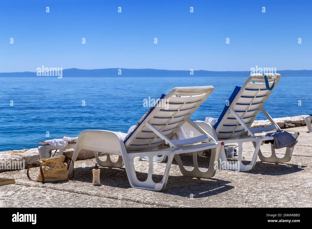 Deck chair on beach hi-res stock photography and images - Alamy