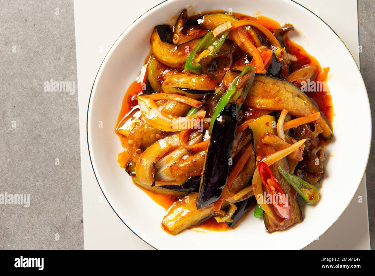 Stirfried eggplant and vegetables with spicy spices Stock Photo Alamy