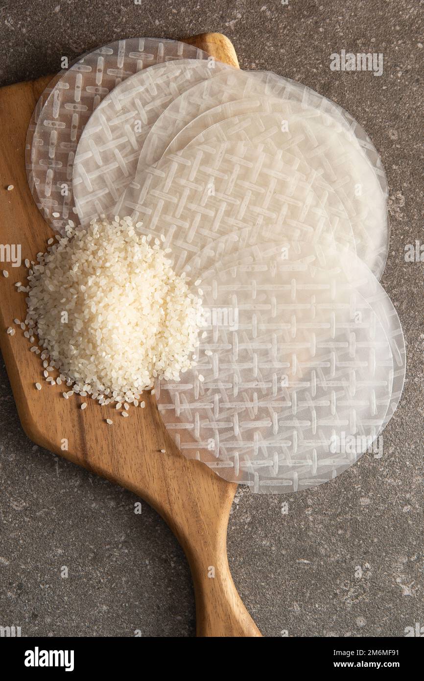 Isolated Rice Paper raw rice and rice paper Stock Photo - Alamy