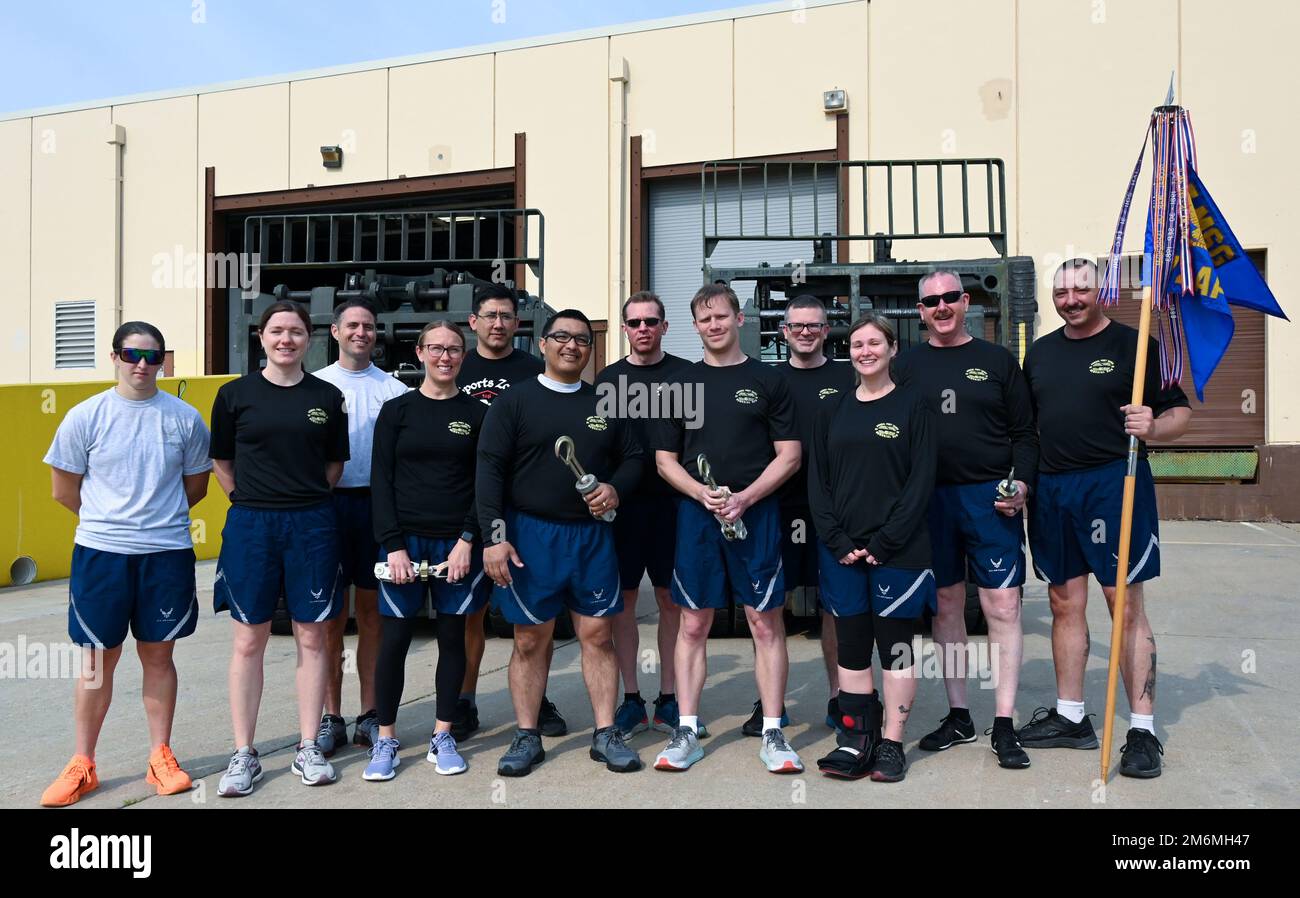 Reservists in the 72nd Aerial Port Squadron at Tinker hold a Port Dawg ...