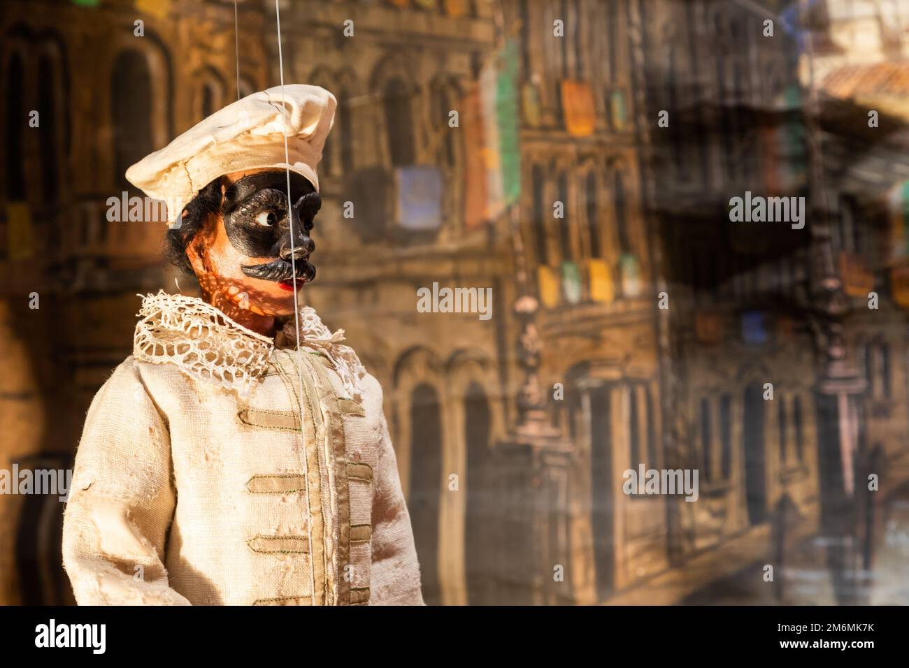 Vintage puppet show theatre made of wood. Old historical puppets. Stock Photo