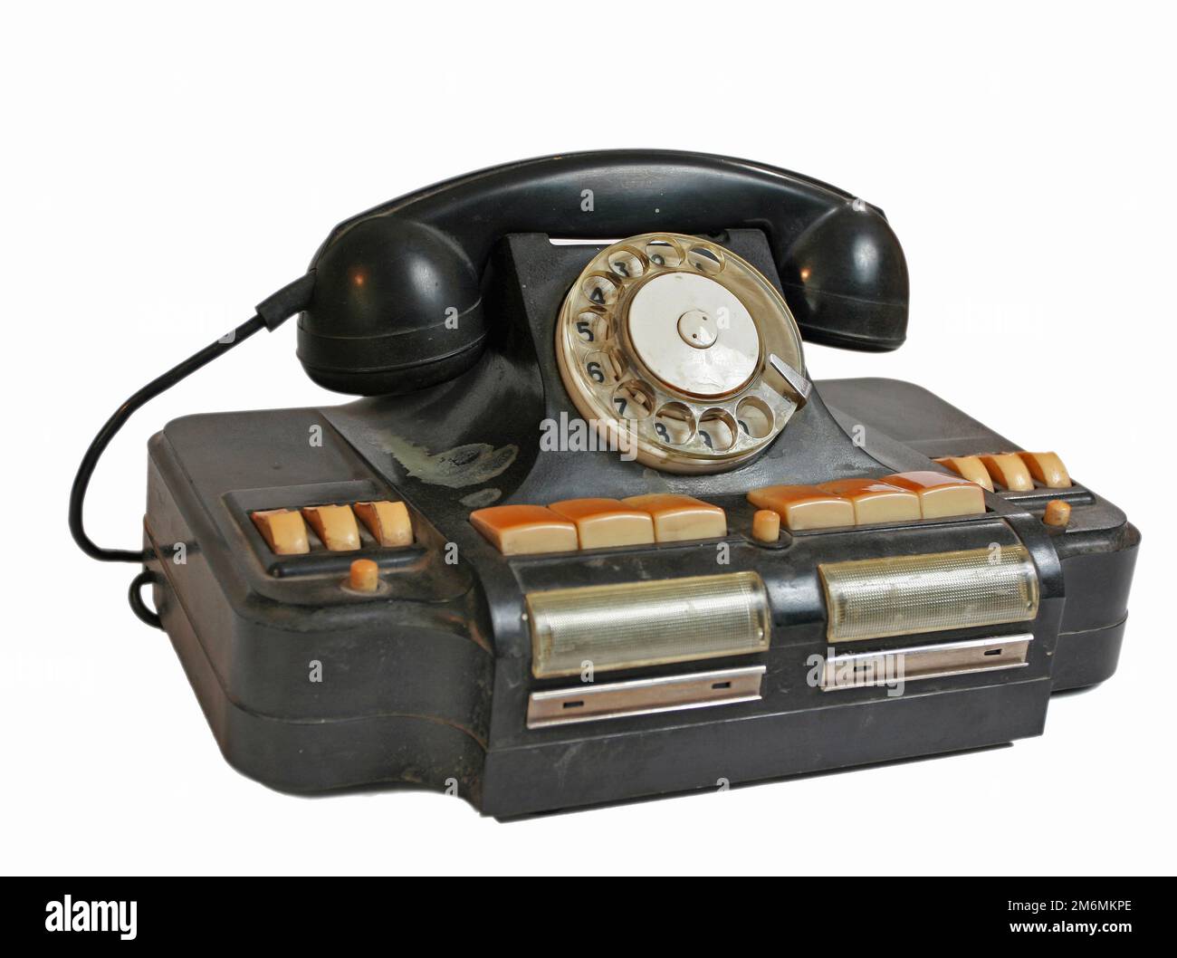 Old grunge vintage Dial Phone on white isolated Stock Photo