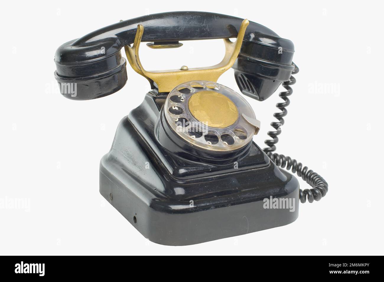 Old grunge vintage Dial Phone on white isolated Stock Photo