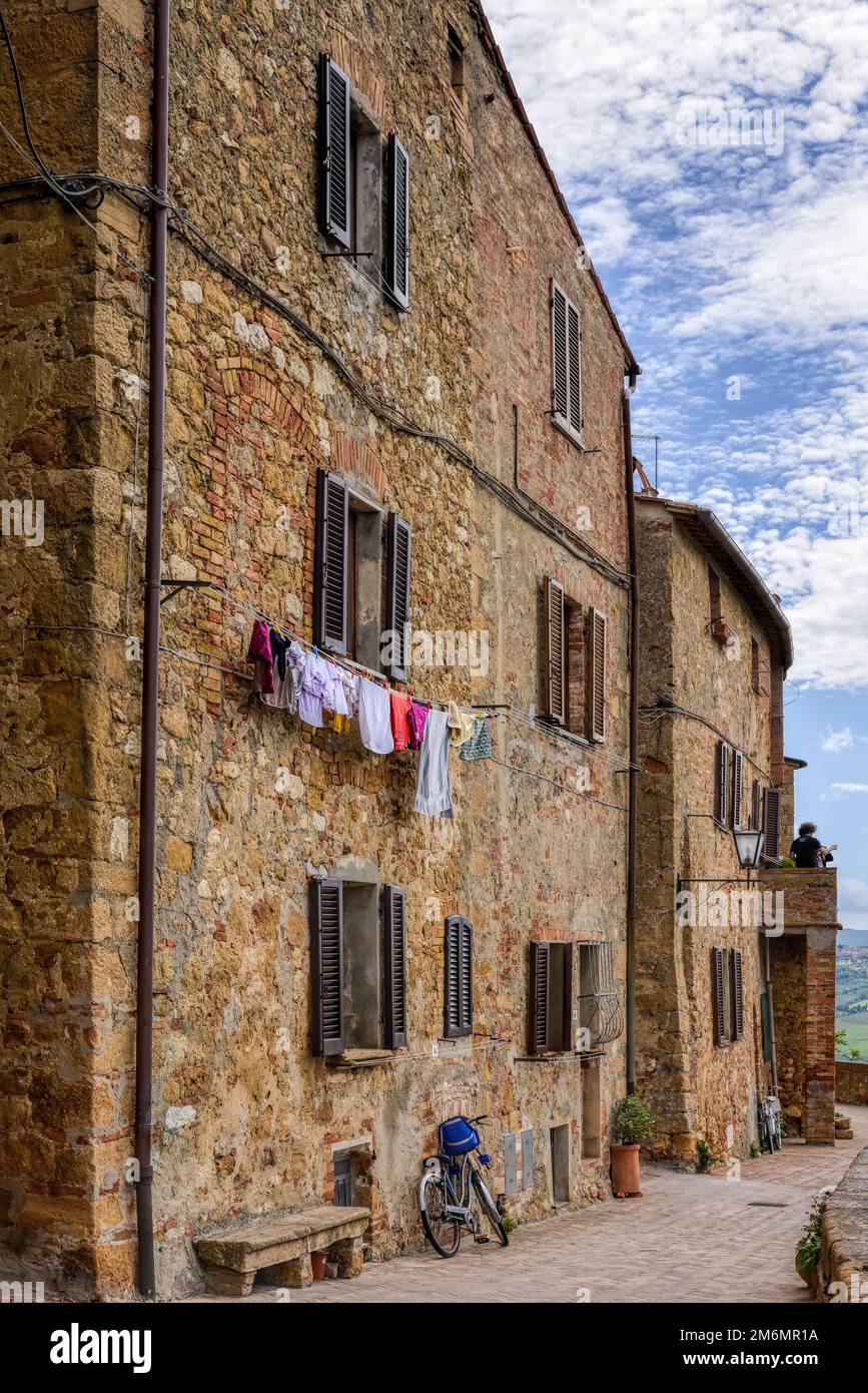 PIENZA, TUSCANY, ITALY - MAY 18 : Washing hanging from a building in Pienza, Tuscany, Italy on May 18, 2013 Stock Photo