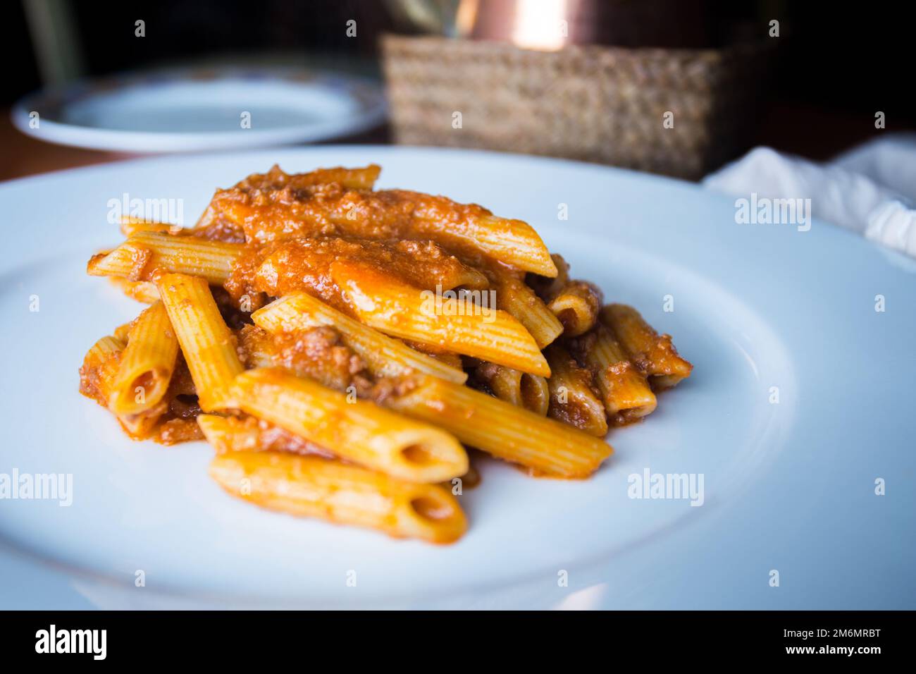 Pasta Penne bolognese. The traditional bolognese sauce recipe contains only a few ingredients