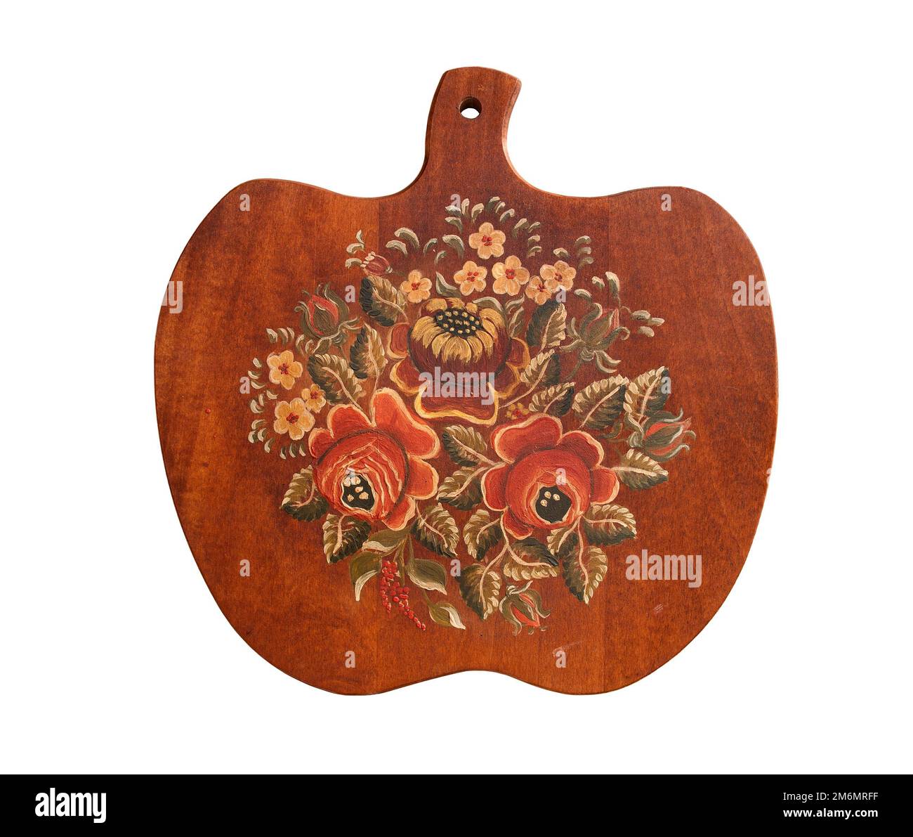 Traditional European bread cutting board in shape of apple, which is a kind of folk art both for kitchen usage and hanging decoration Stock Photo