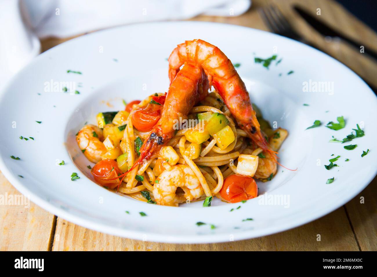 Pasta frutti di mare. Fresh pasta with seafood and vegetables. Stock Photo