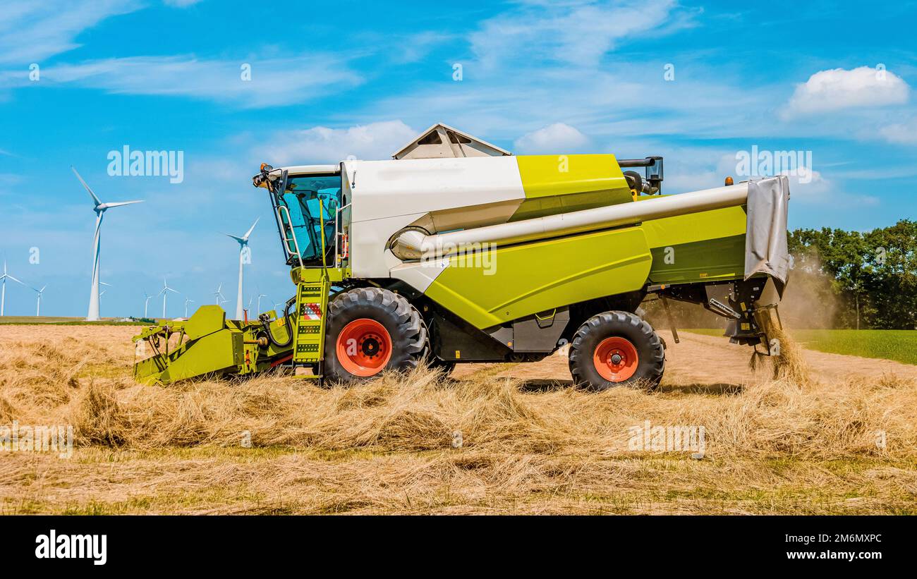 Tractor on the land, Harvesting machine tractor working in the field