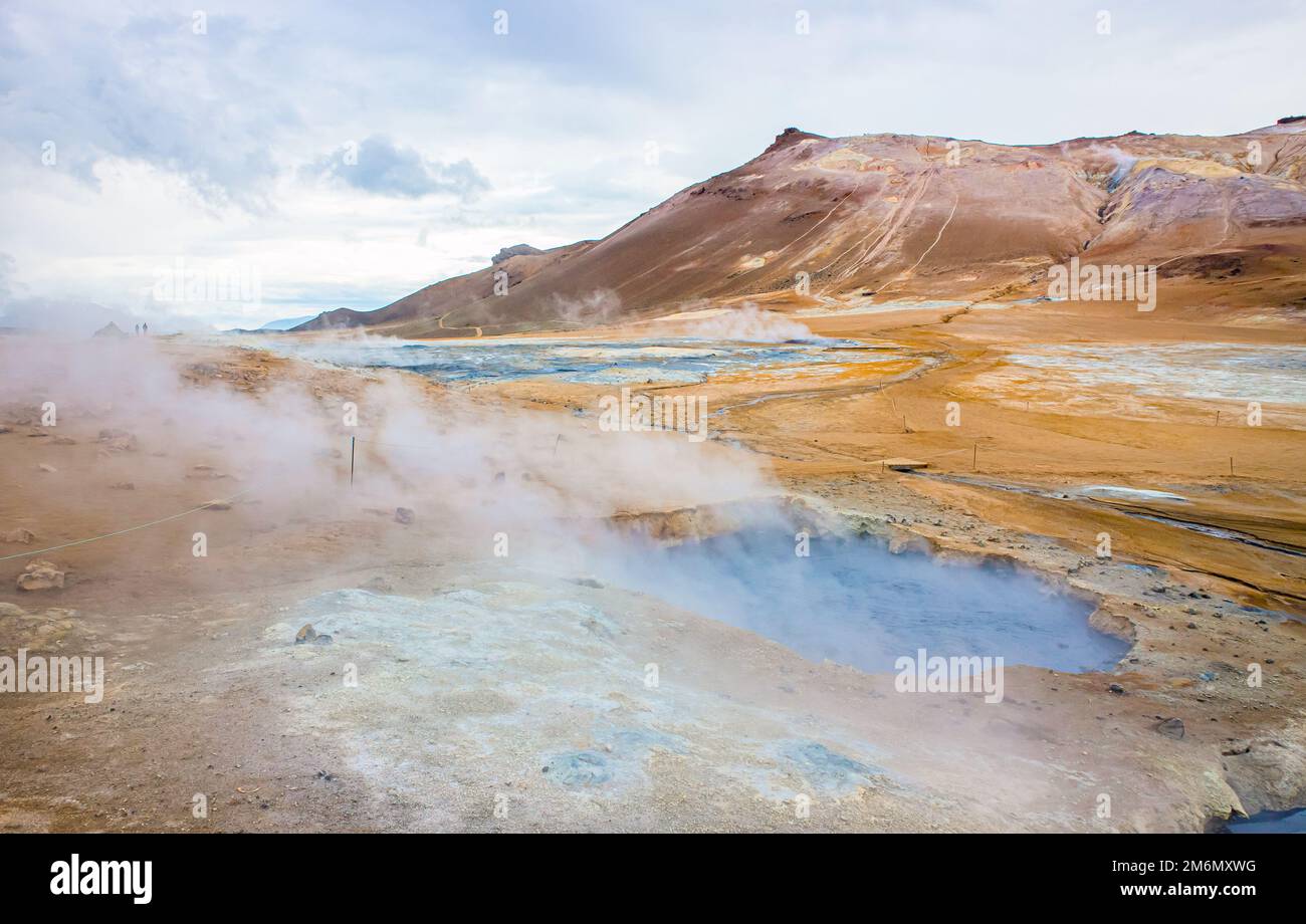 Hverir , Iceland geothermal area at the Namafjall volcanic mountain. Hverir is also known as Namafjall or Namaskard. Surreal nature landscape. Stock Photo