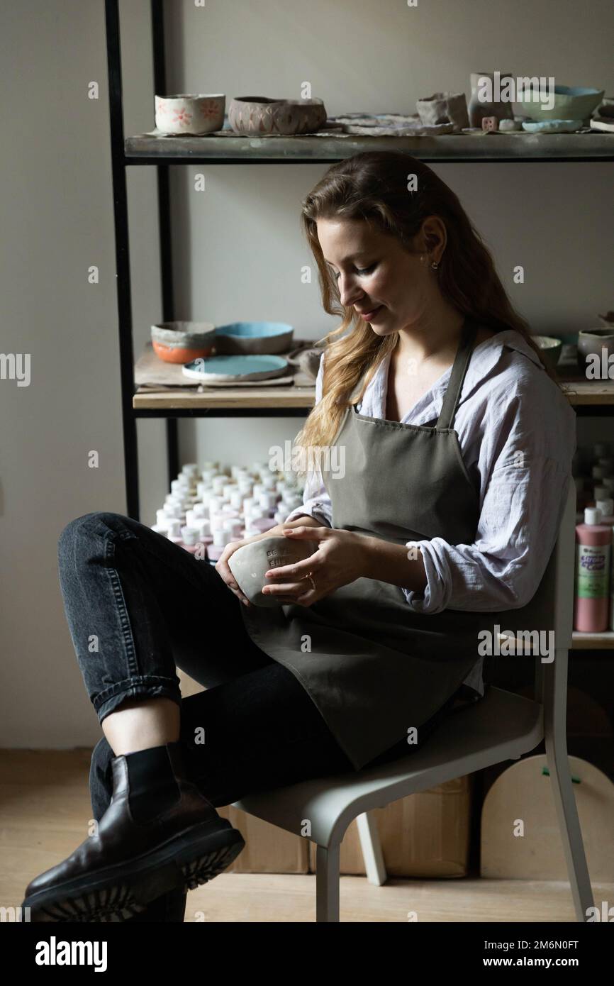 girl potter, business owner in her studio. the concept of small business Stock Photo