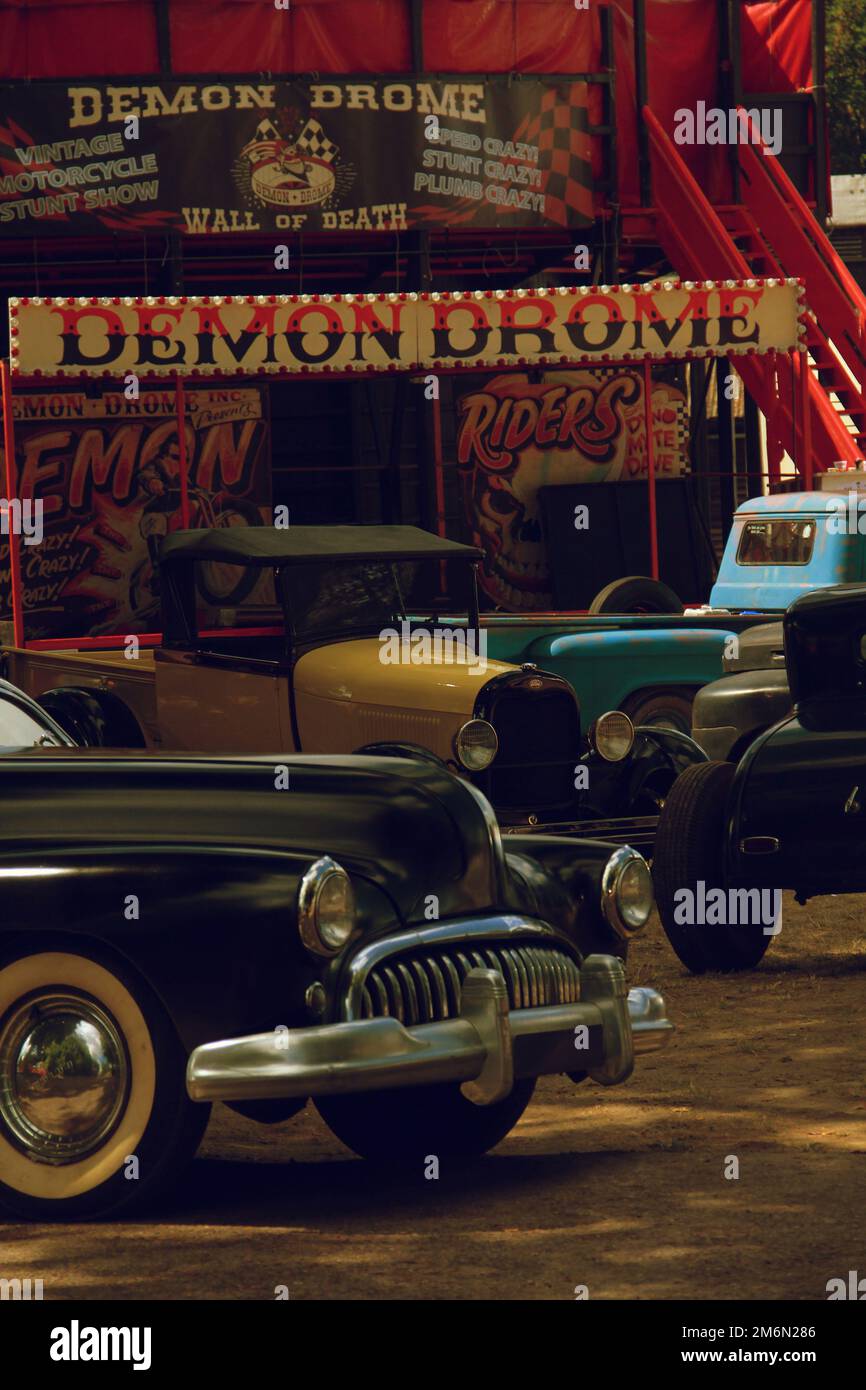 Hot Rod Hayride. Vintage vehicles parked outside the Wall of Death Motorcycle stunt show Stock Photo