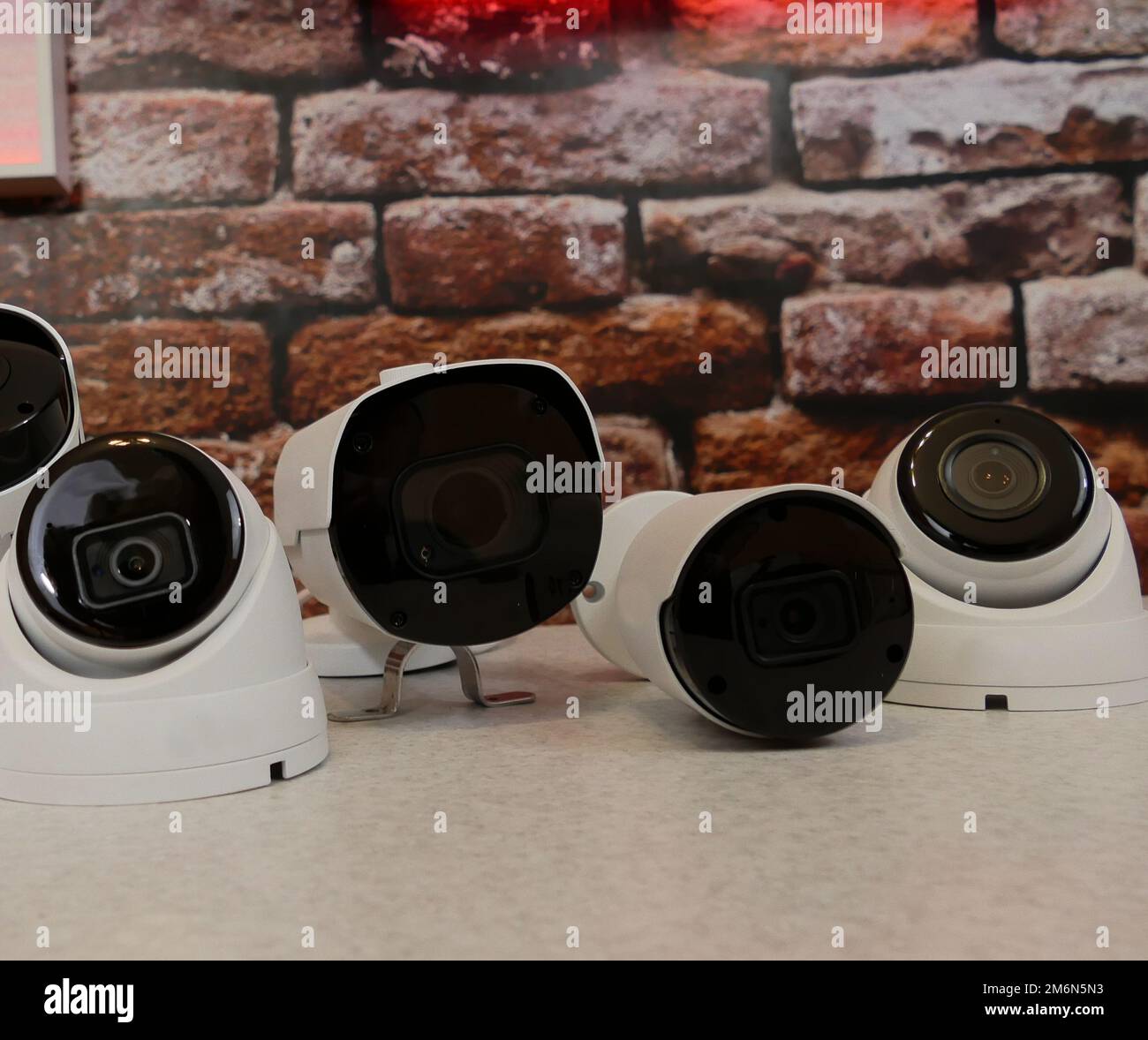 Metal outdoor CCTV cameras for video surveillance systems on a shelf at security store Stock Photo