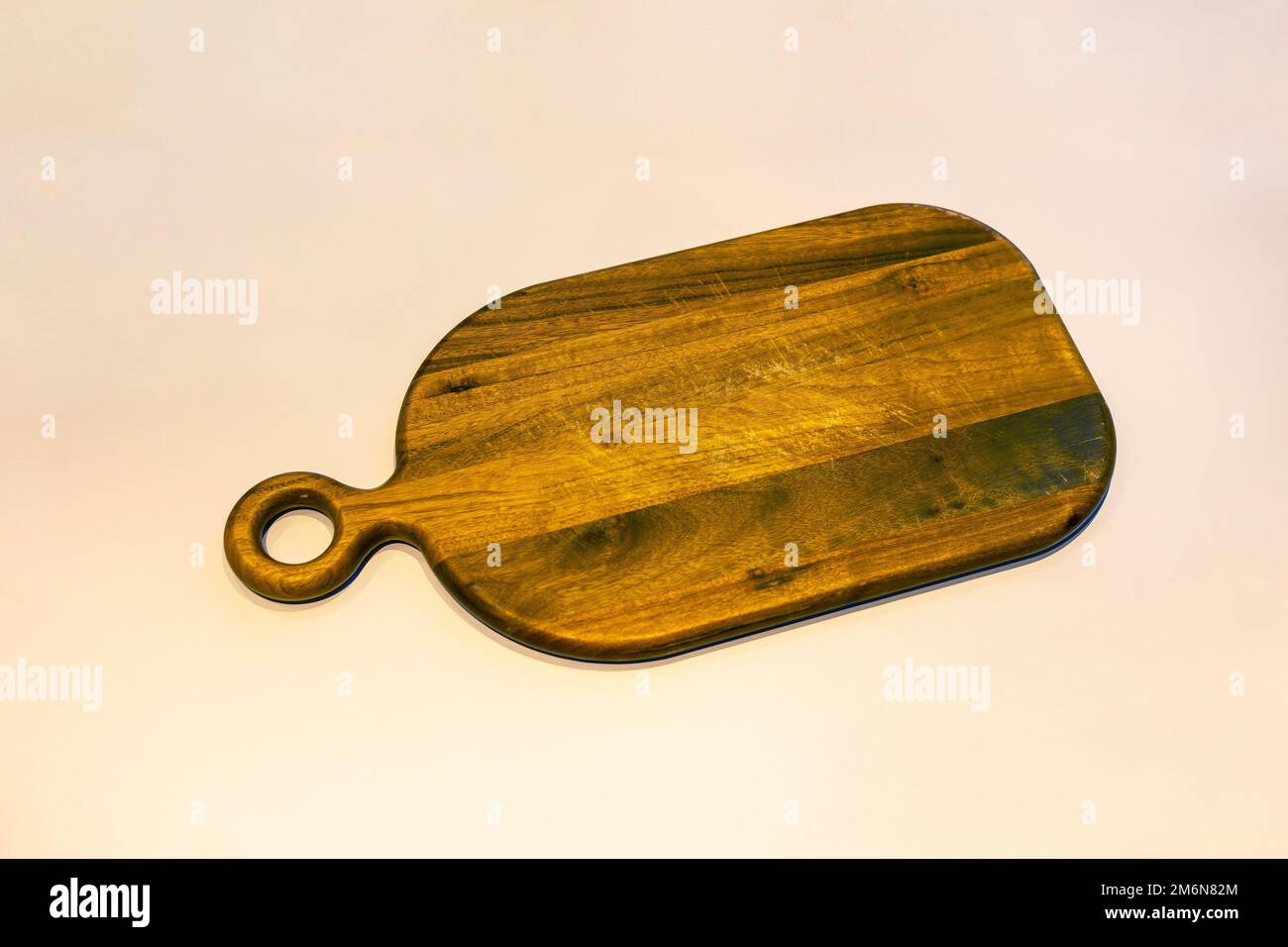 Wooden cutting board on the white background Stock Photo
