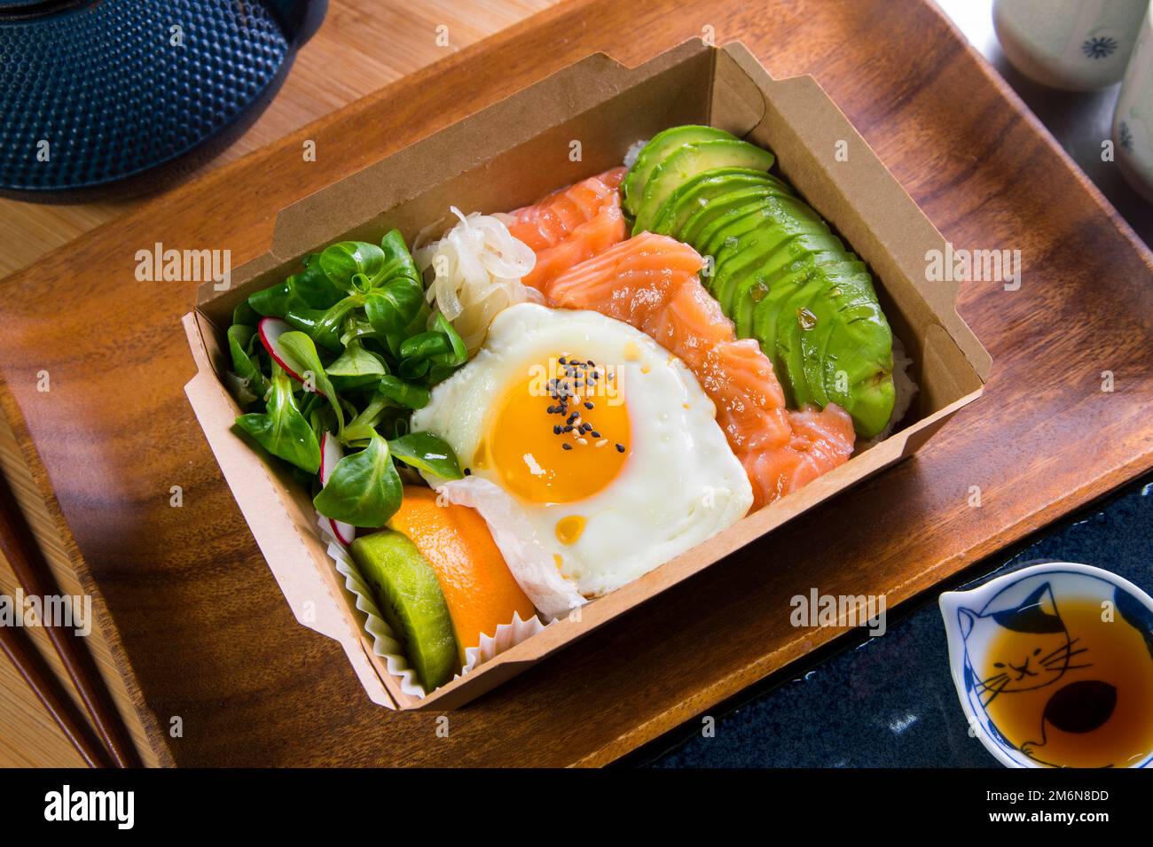Donburi Salmon served in a Japanese restaurant in Tokyo . Japanese