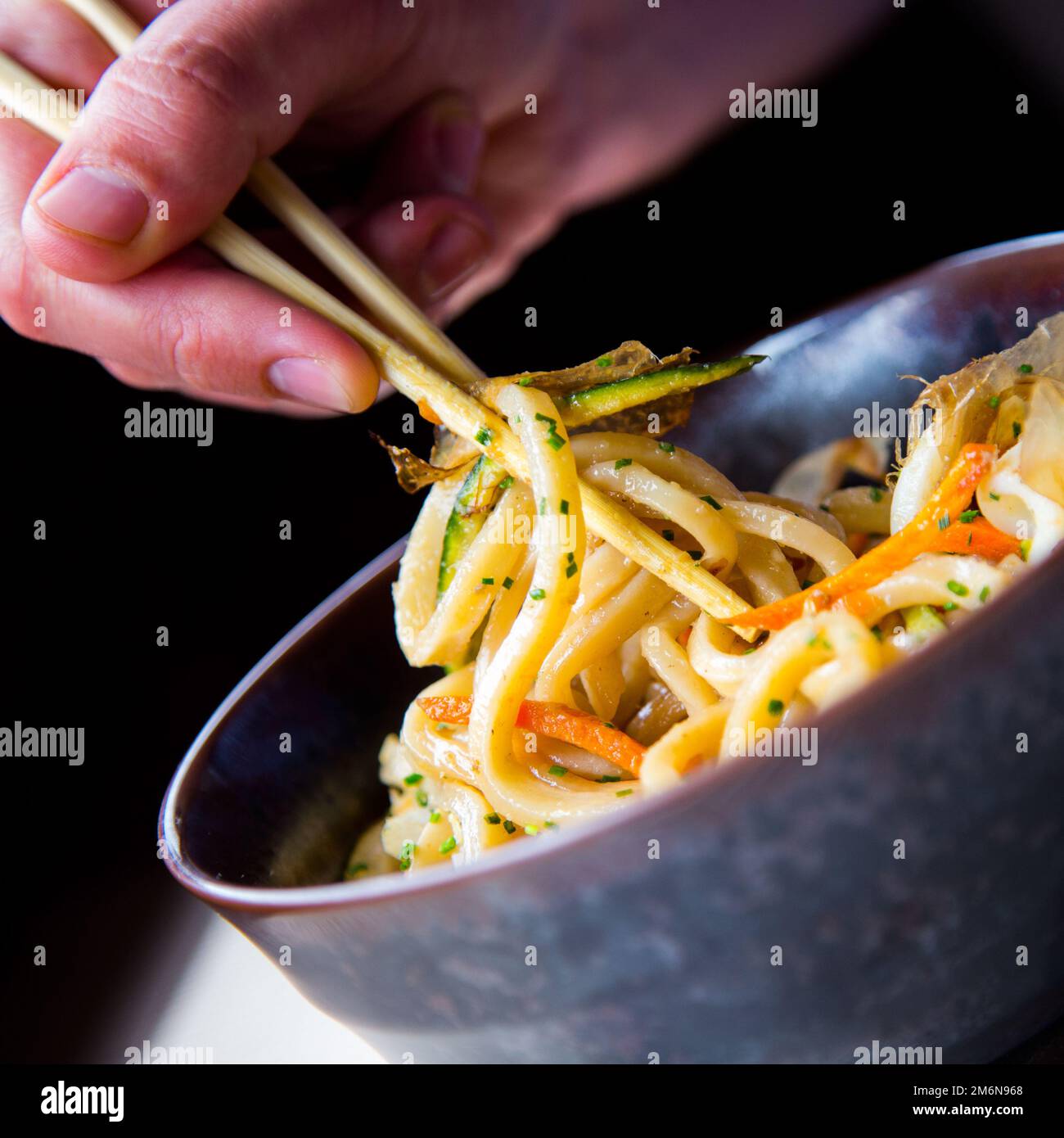 Yakisoba, literally "fried noodles", integrated into Japanese cuisine, just like ramen. Stock Photo