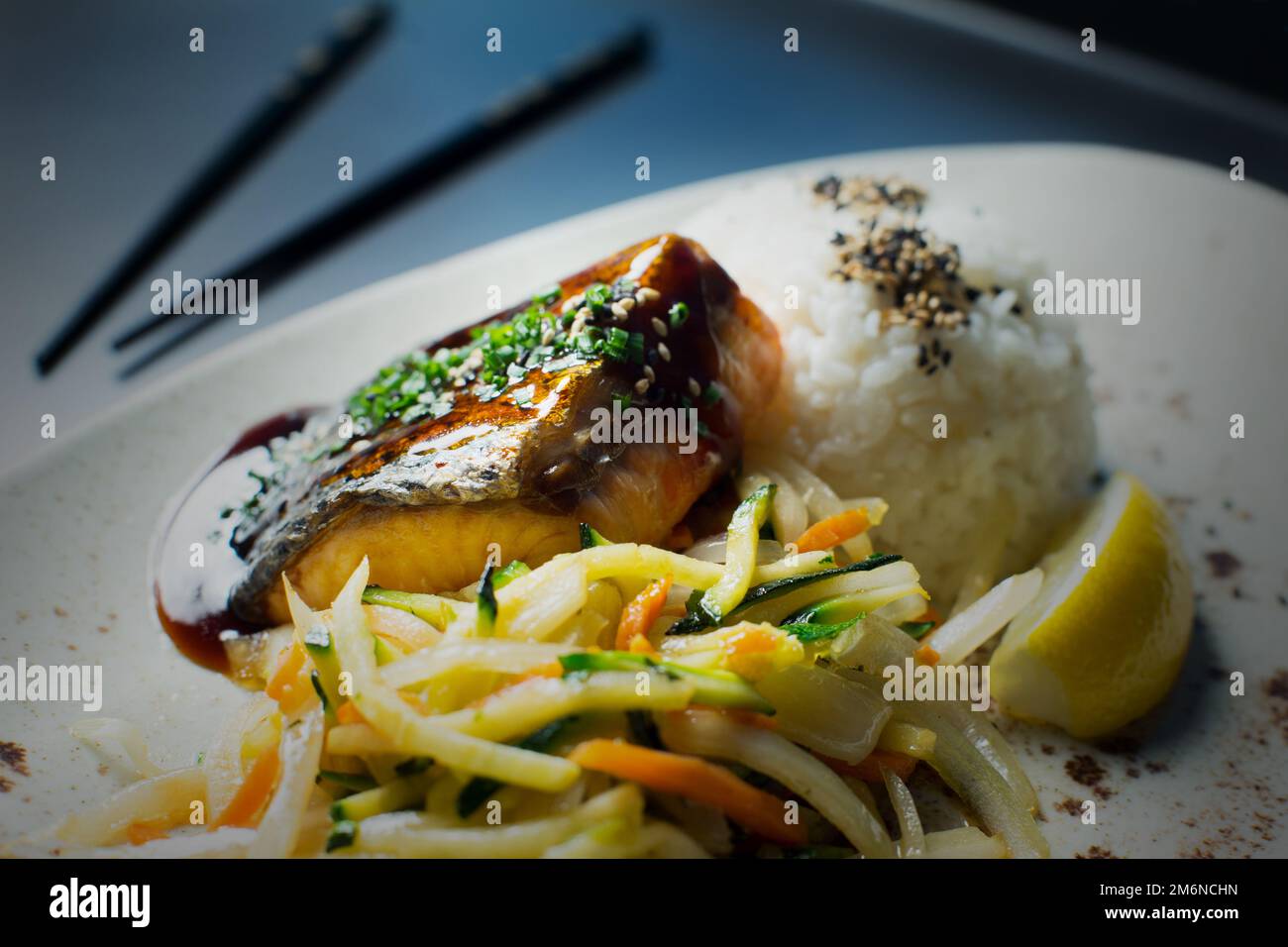 Baked salmon served with teriyaki sauce. Japanese Recipe Stock Photo