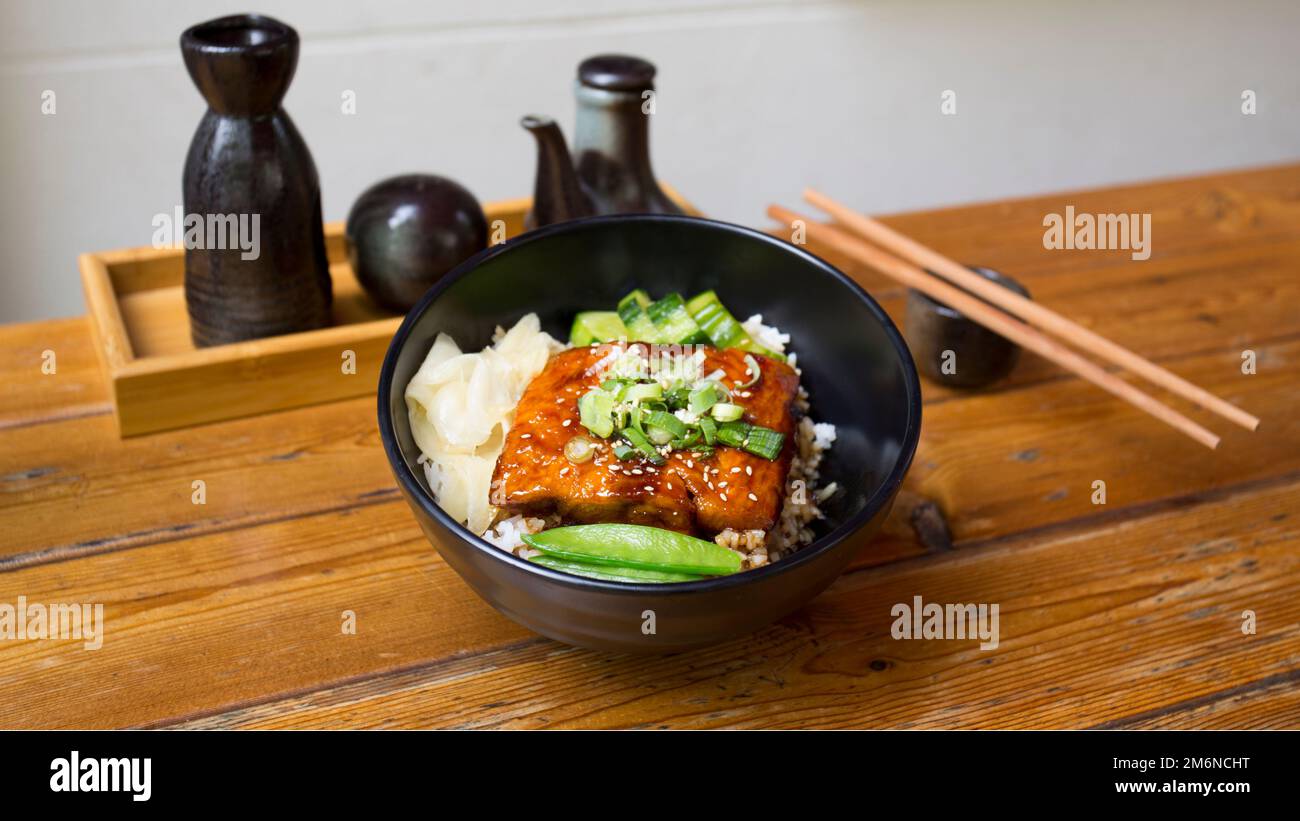 Baked salmon served with teriyaki sauce. Japanese Recipe Stock Photo