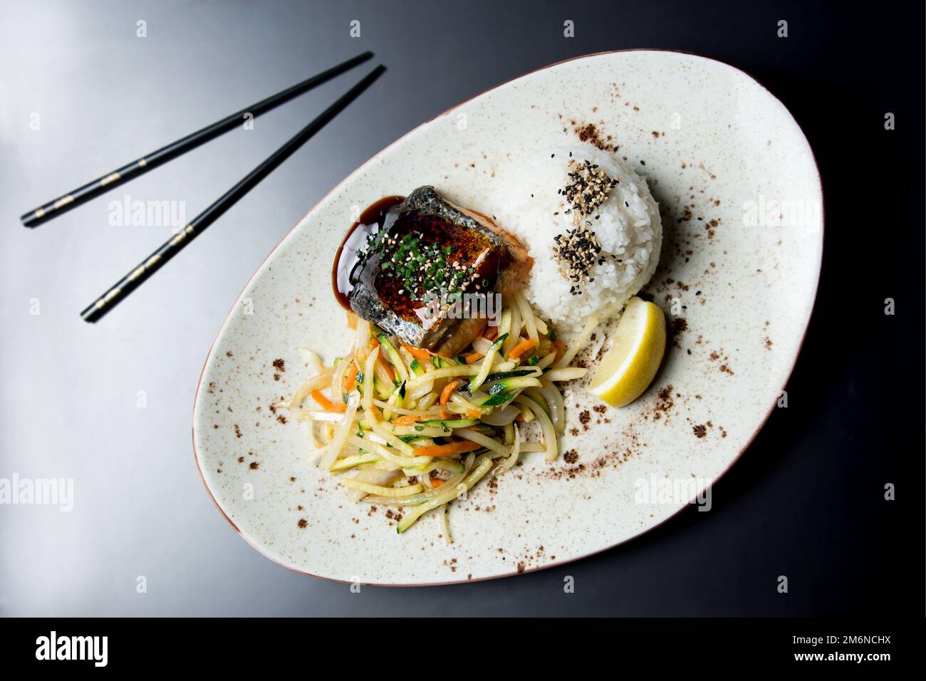 Baked salmon served with teriyaki sauce. Japanese Recipe Stock Photo