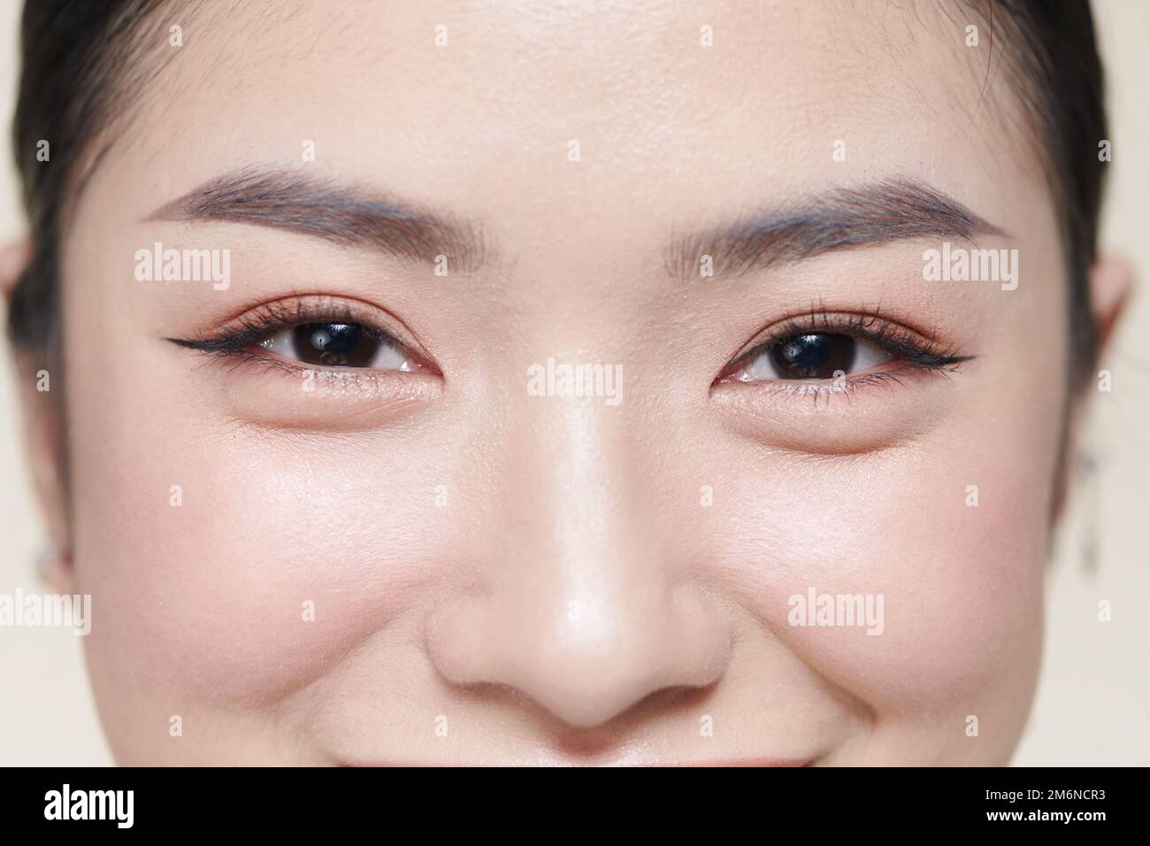 A half of a beautiful female's face with eye bags Stock Photo