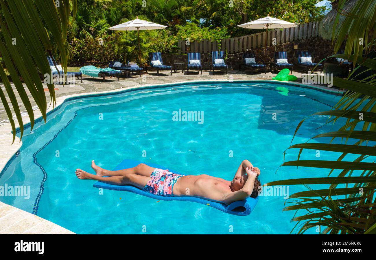 Reading a water thermometer in swimming pool, checking water temperature  Stock Photo - Alamy