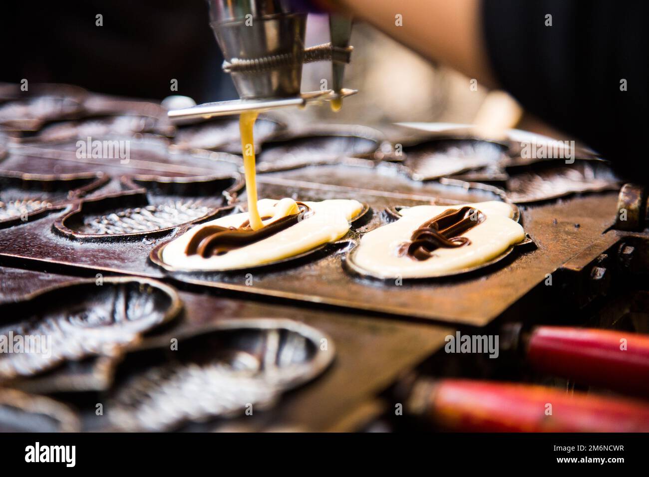 Taiyaki is a fishshaped Japanese cake. The most common filling is