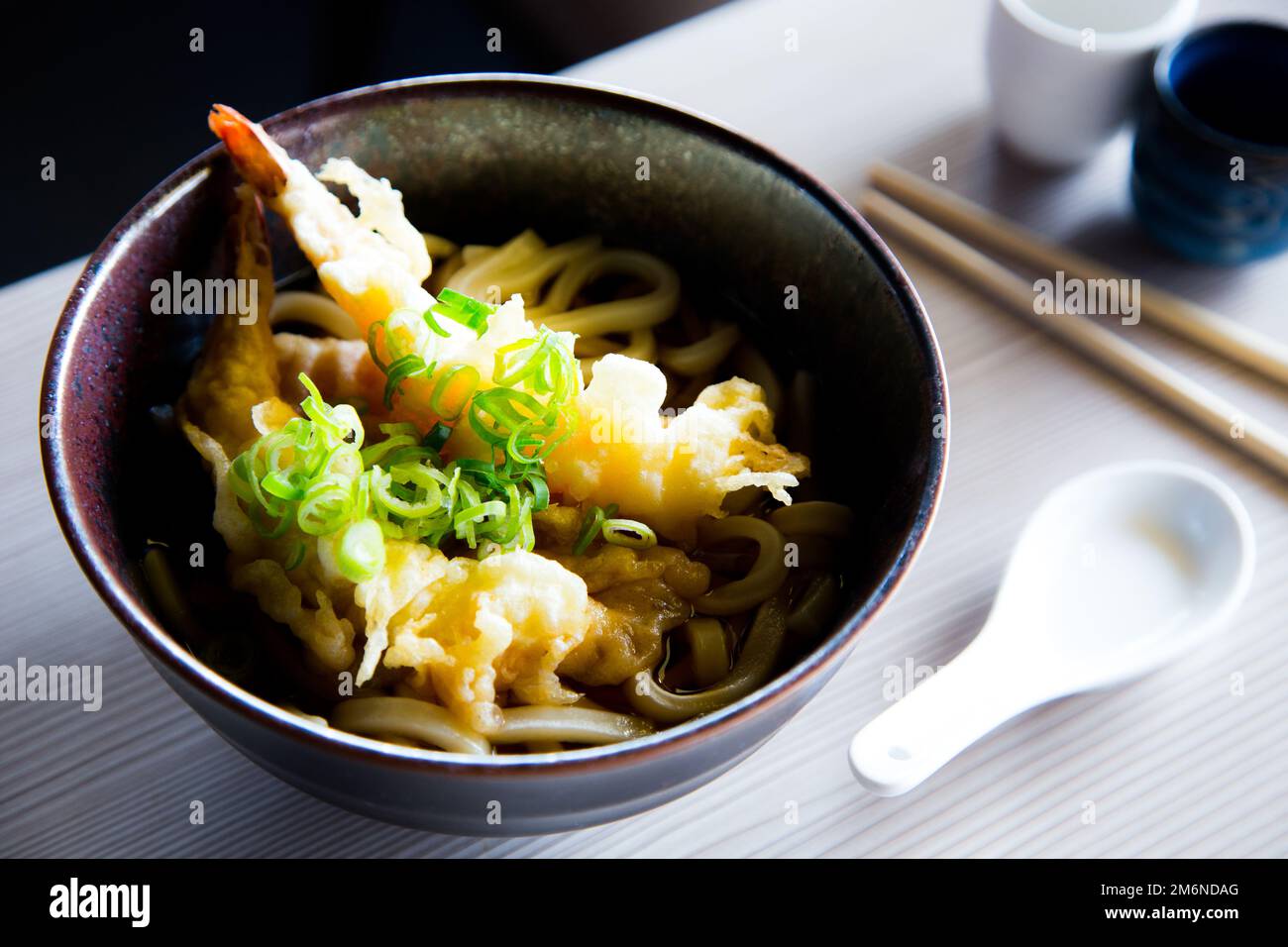 Japanese soup ramen with shrimps in tempura. Traditional Osaka recipe. Stock Photo