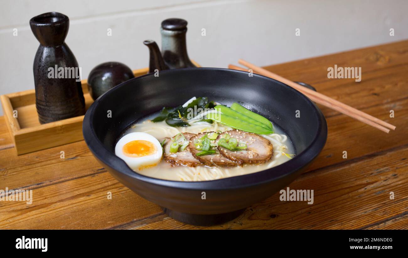 Japanese soup Ramen with pork and vegetables. Traditional Osaka recipe
