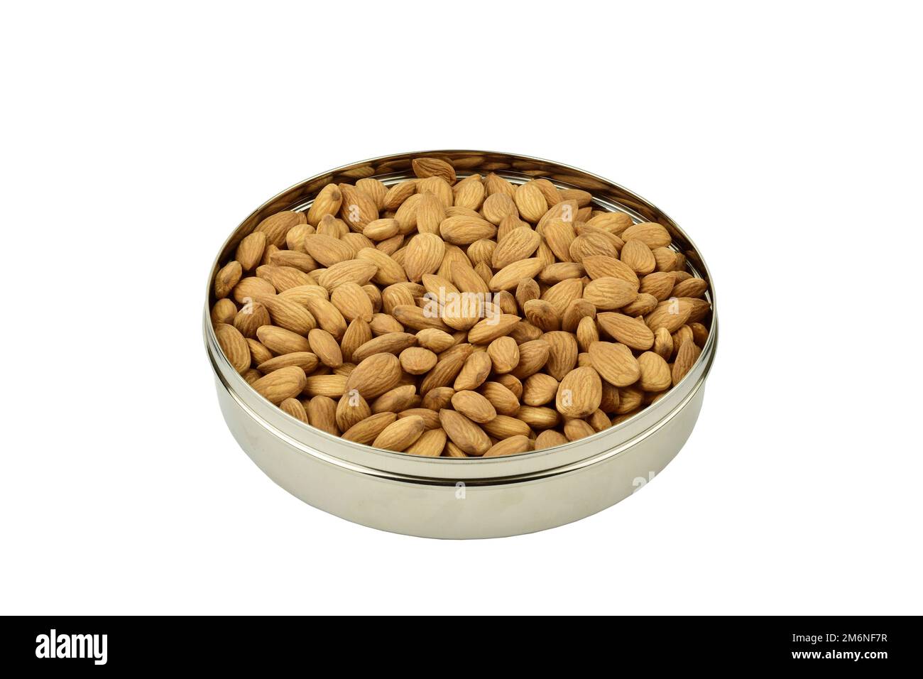 Almond in round steel box isolated on white background with clipping path Stock Photo