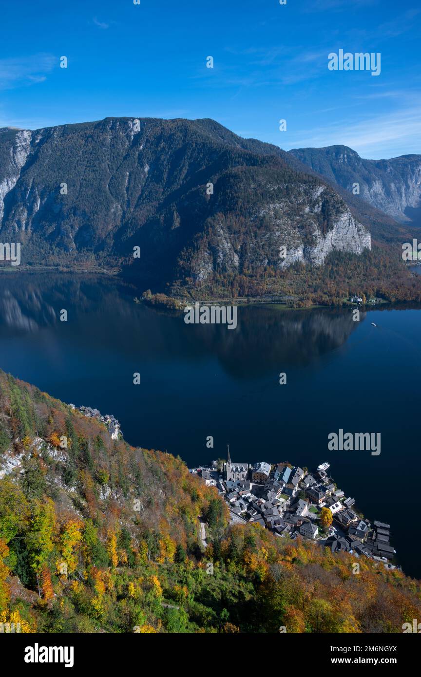 Aerial view of the picturesque Hallstatt village with traditional chalet wooden houses captured from the observation deck at Hallstatt, Austria. Stock Photo