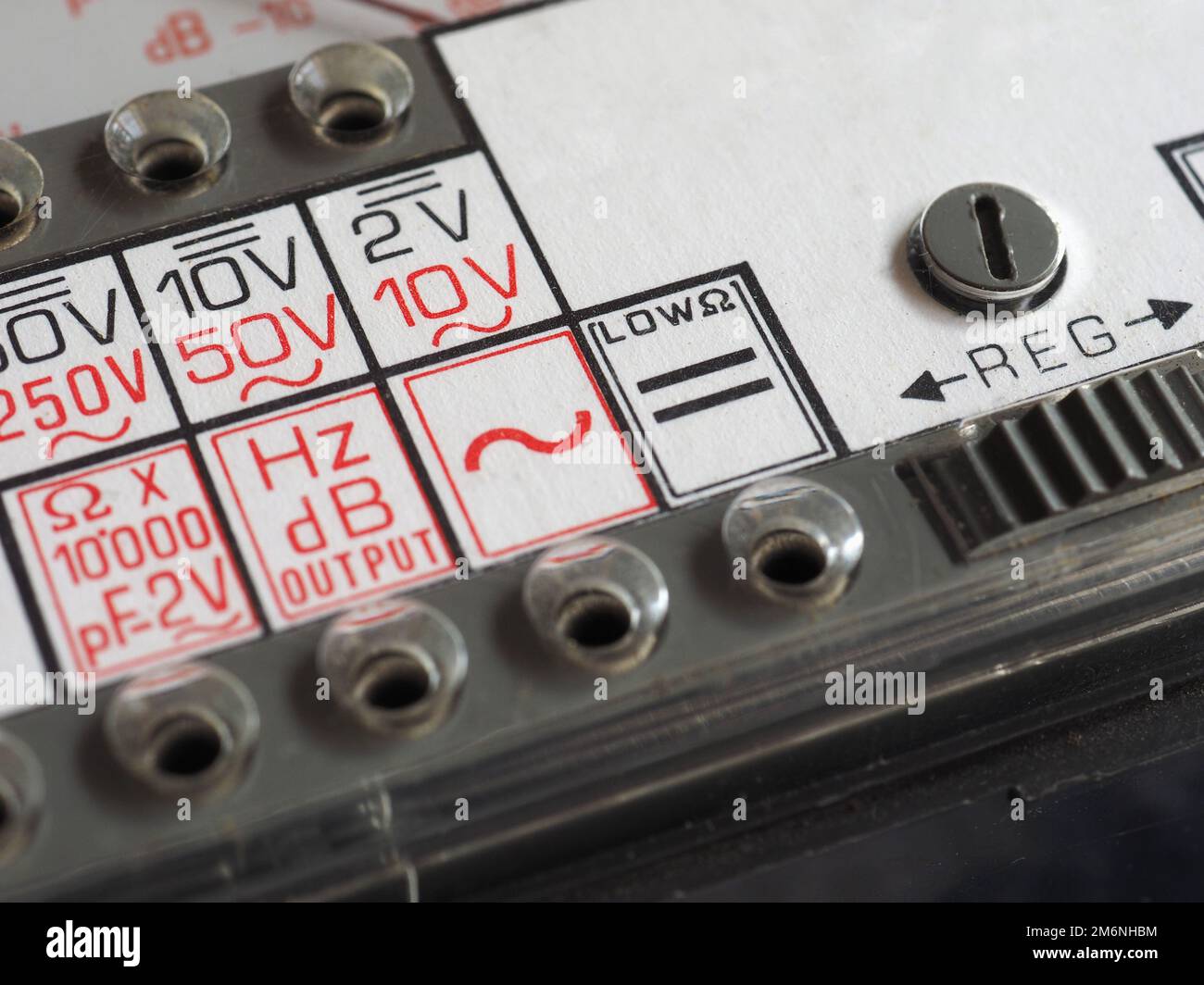 electrical symbols on a vintage analog multimeter measuring instrument