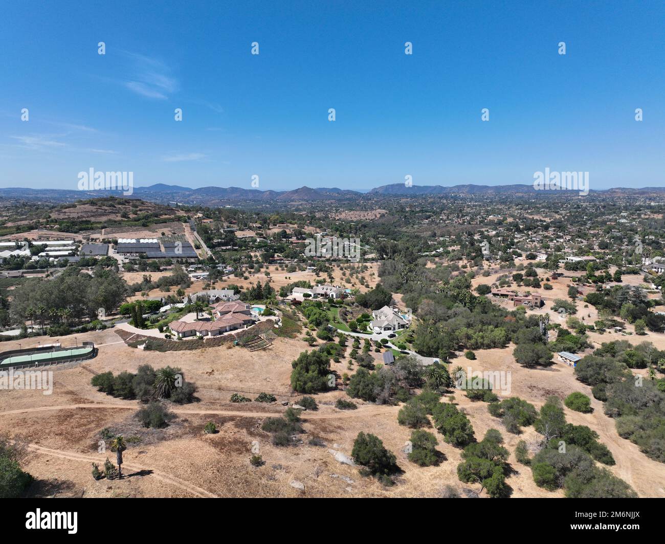 Aerial view of dry valley with houses and barn in Escondido, California Stock Photo Alamy