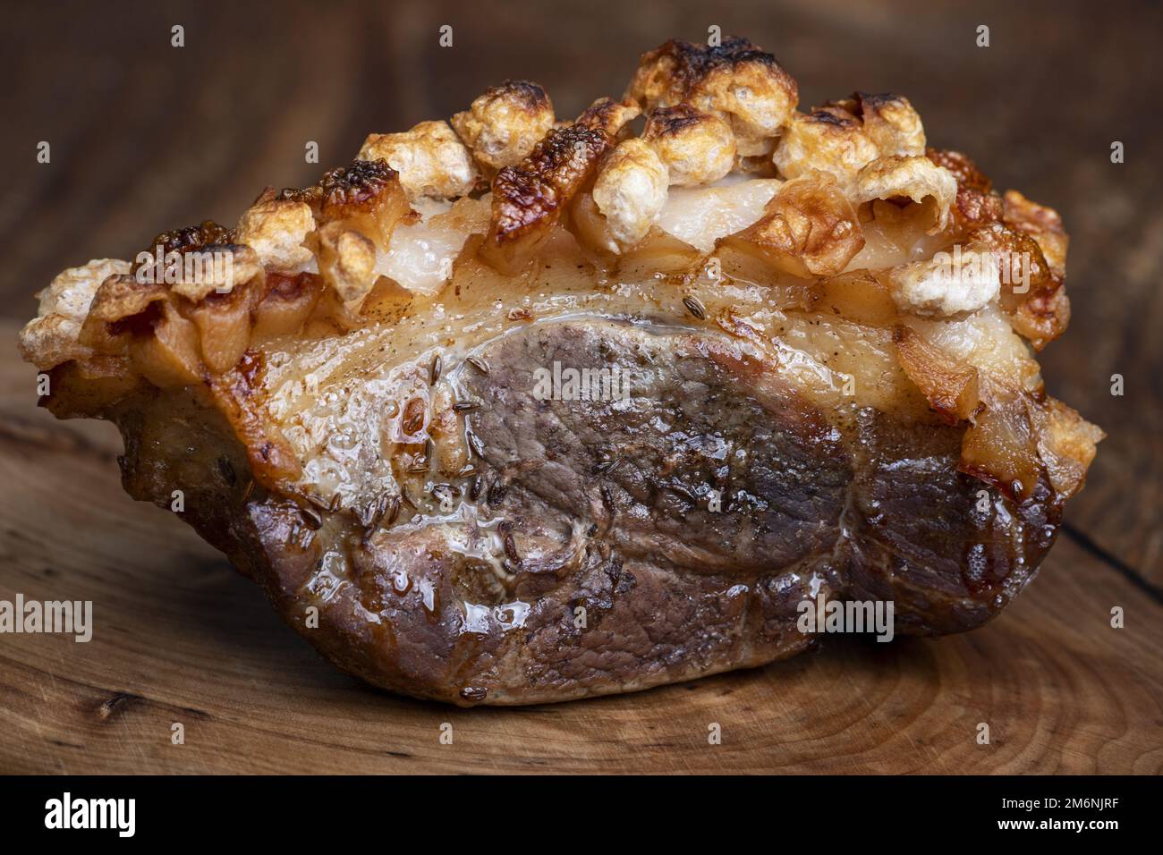Roast pork on a cutting board Stock Photo