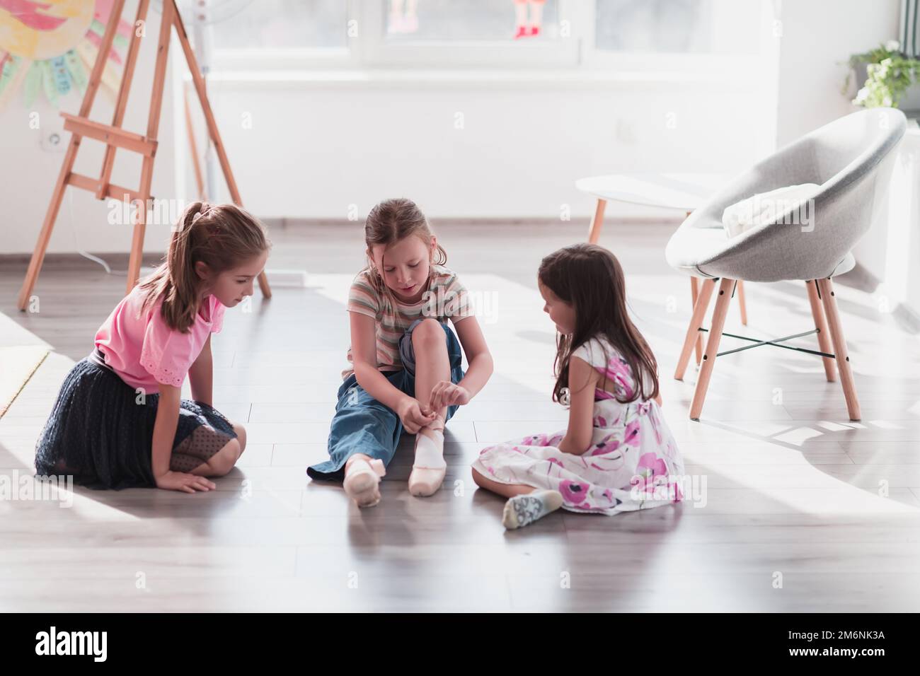 Little girls are getting ready for ballet lessons Stock Photo