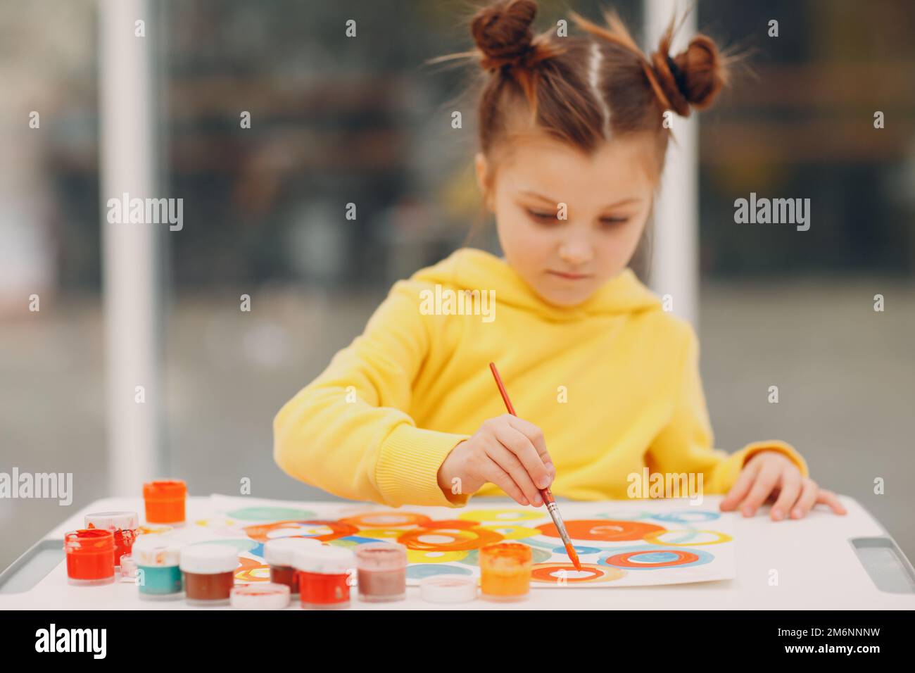 Little girl drawing art picture. Painting with brush and paints Stock ...