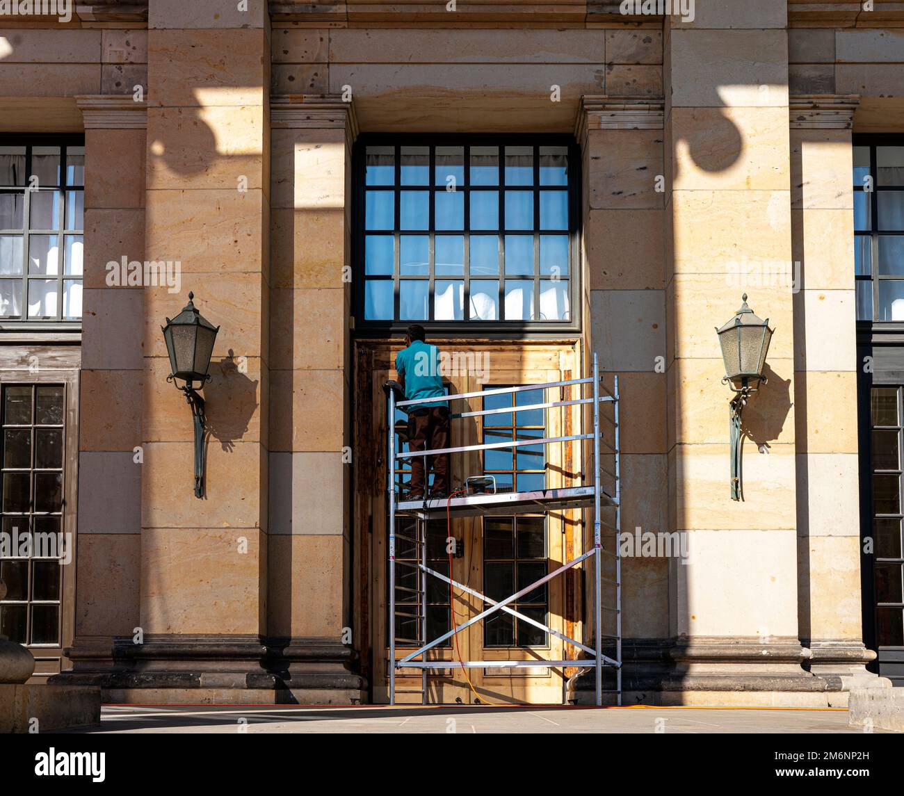 Craftsman With Small Wooden Ladder, Berlin, Germany Stock Photo