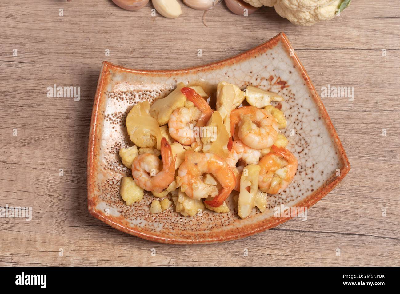 Stir-fried shrimp with cauliflower. Tasteless food. Healthy. Stock Photo