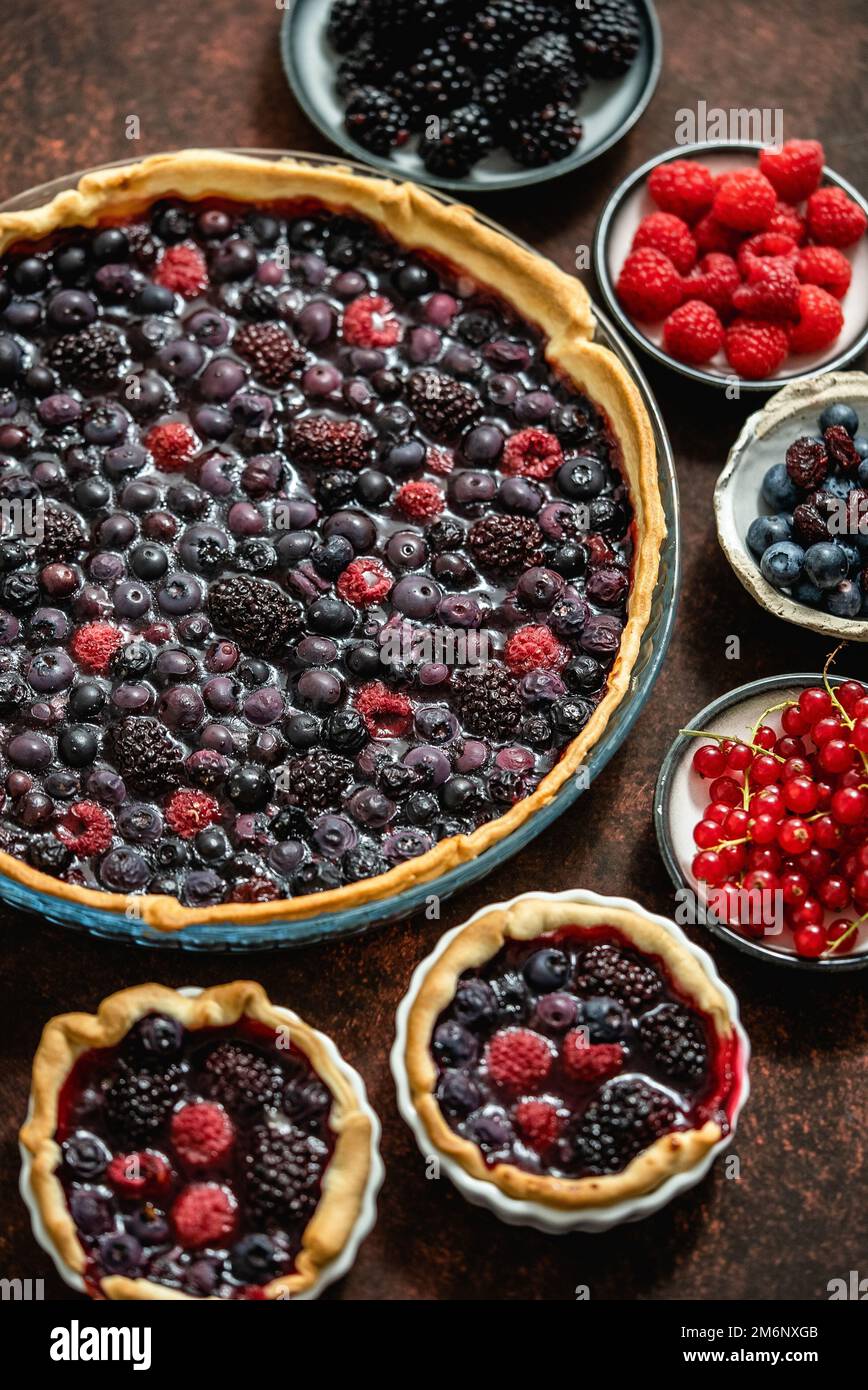 Homemade fresh round cake tart with berries, raspberries, blackberries Stock Photo