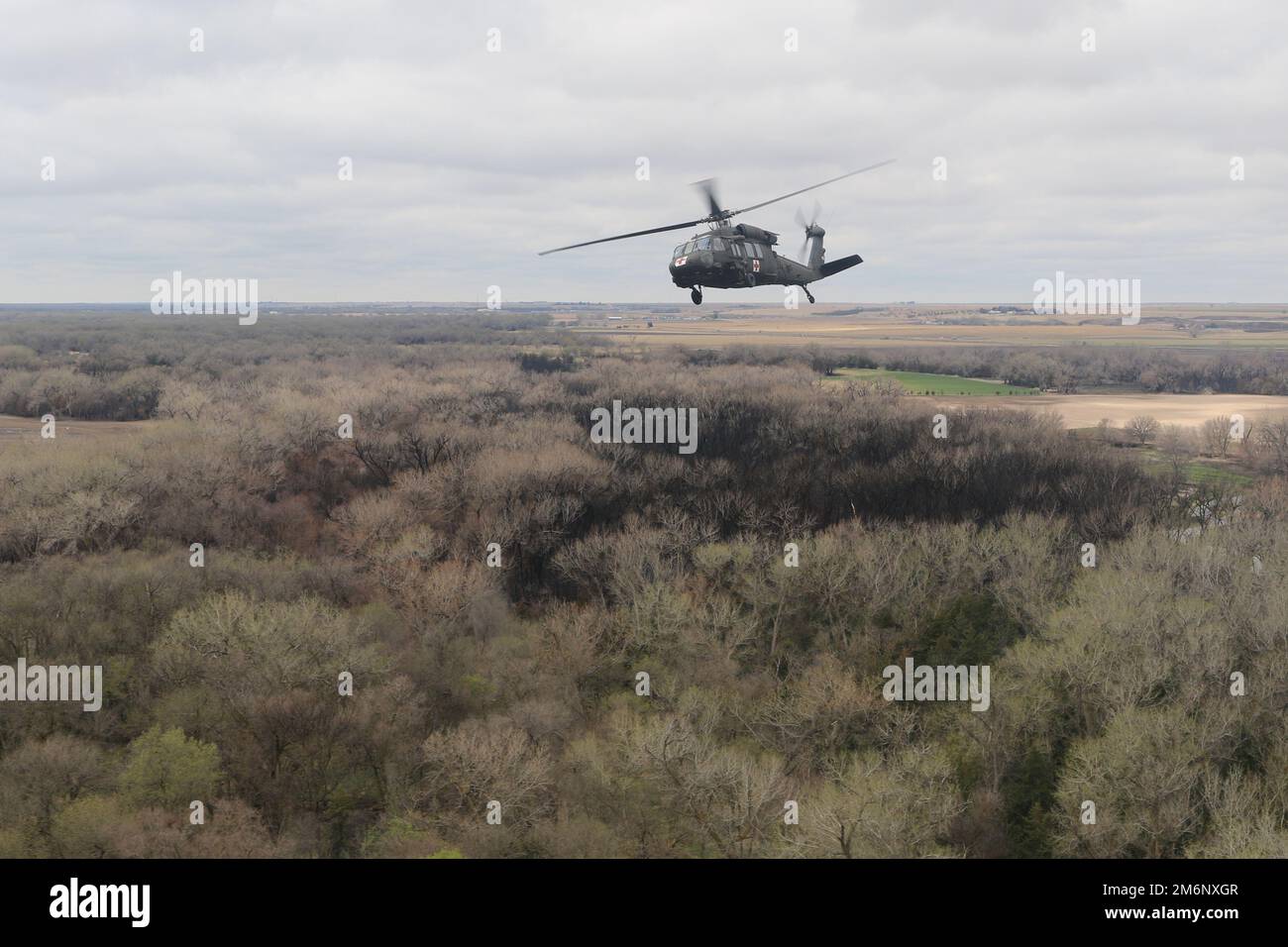 Nebraska Army National Guard soldiers fly a UH60 Black Hawk helicopter