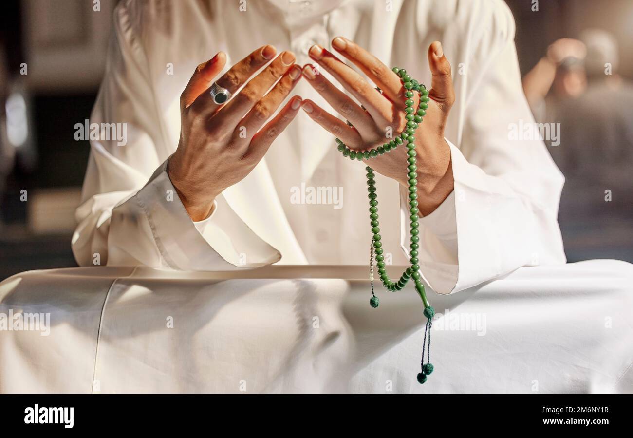 Hands Prayer Beads And Muslim Man Praying In Mosque Temple Or Church Hands Prayer Beads And Muslim Man Praying In Mosque Temple Or Church