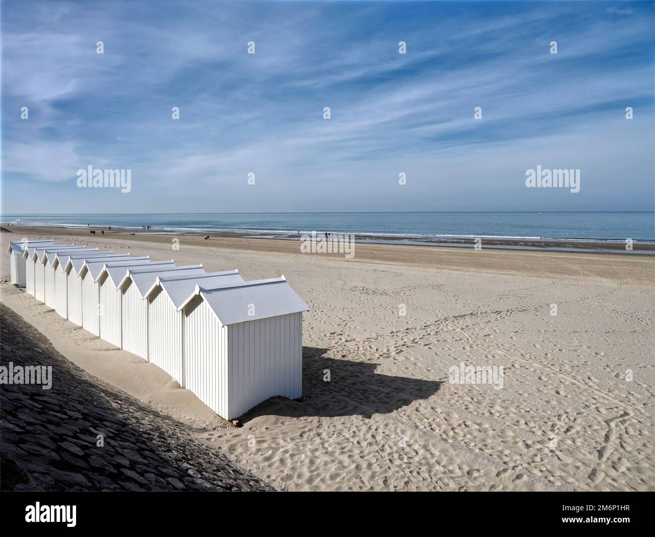 White beach cabins on the beach of Fort Mahon, a commune in the Somme department in Hauts-de-France in northern France. Stock Photo