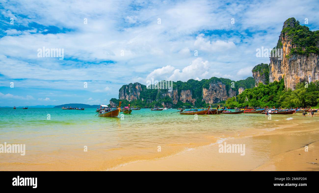 Long tail boats at Railay beach, Krabi, Thailand. Tropical paradise, turquoise water and white sand. Stock Photo