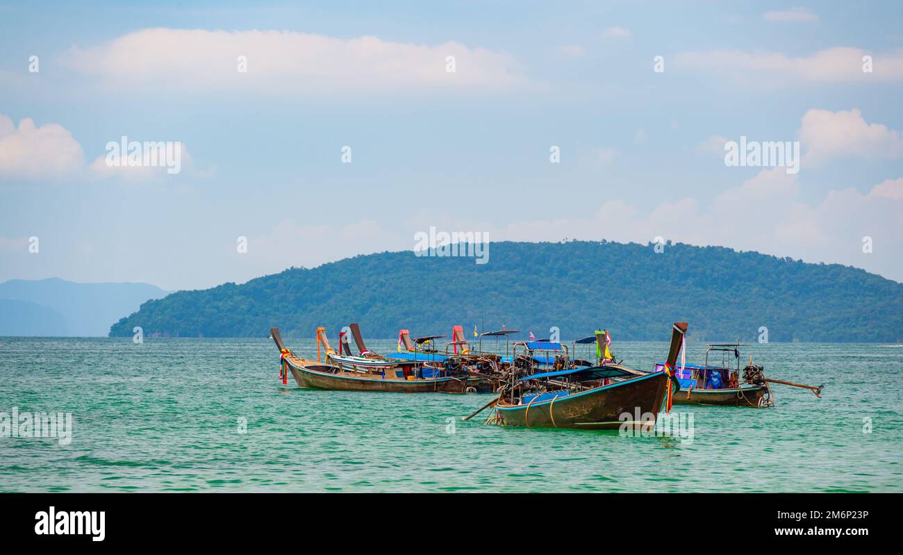 Long tail boats at Railay beach, Krabi, Thailand. Tropical paradise, turquoise water and white sand. Stock Photo