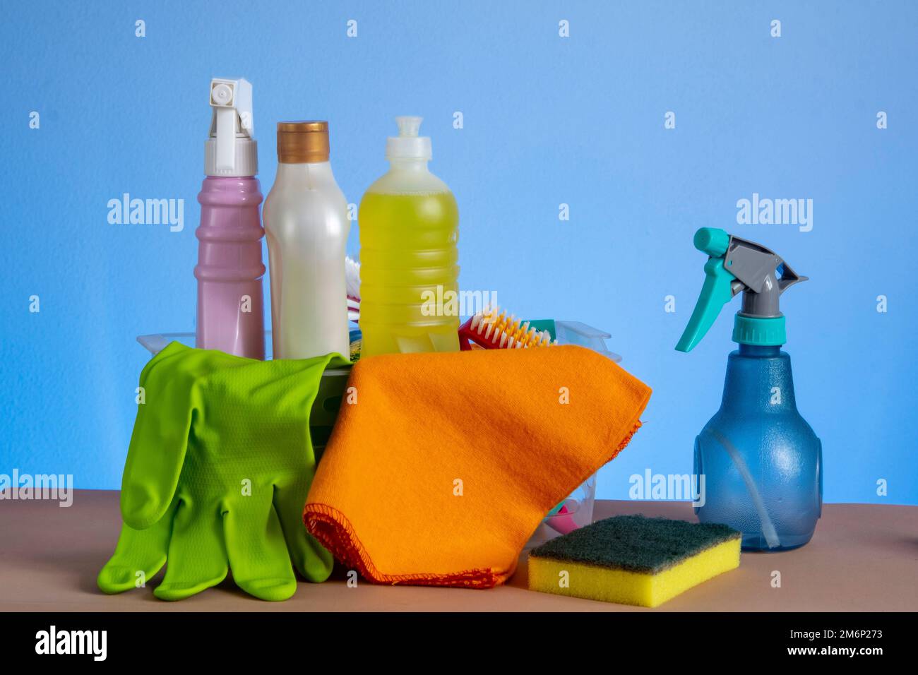 basket with cleaning products for home hygiene use with plastic