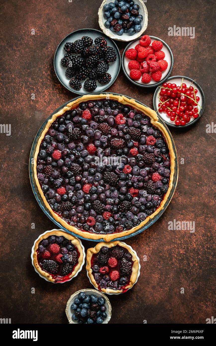 Homemade fresh round cake tart with berries, raspberries, blackberries Stock Photo
